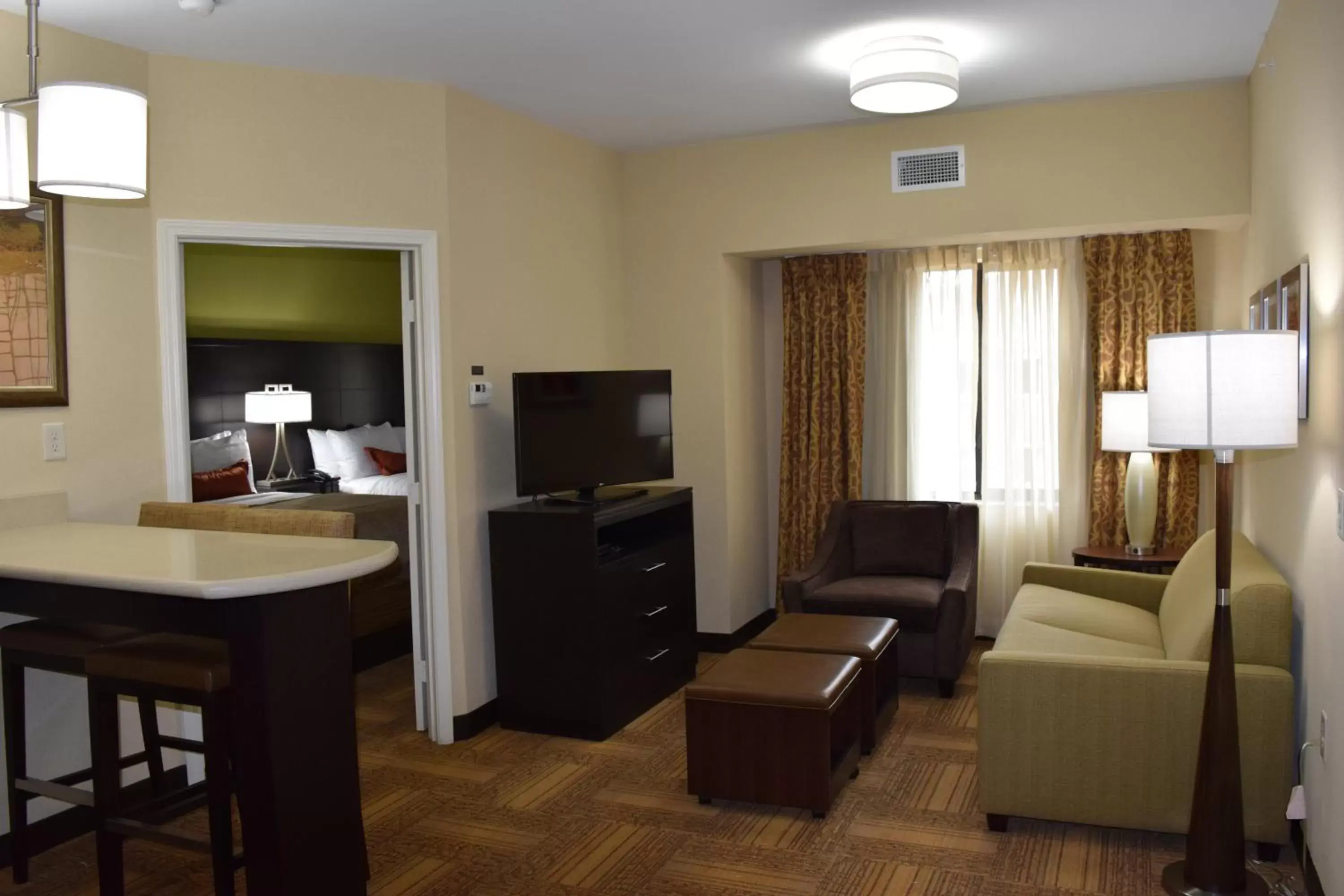 Photo of the whole room, Seating Area in Staybridge Suites Tomball, an IHG Hotel