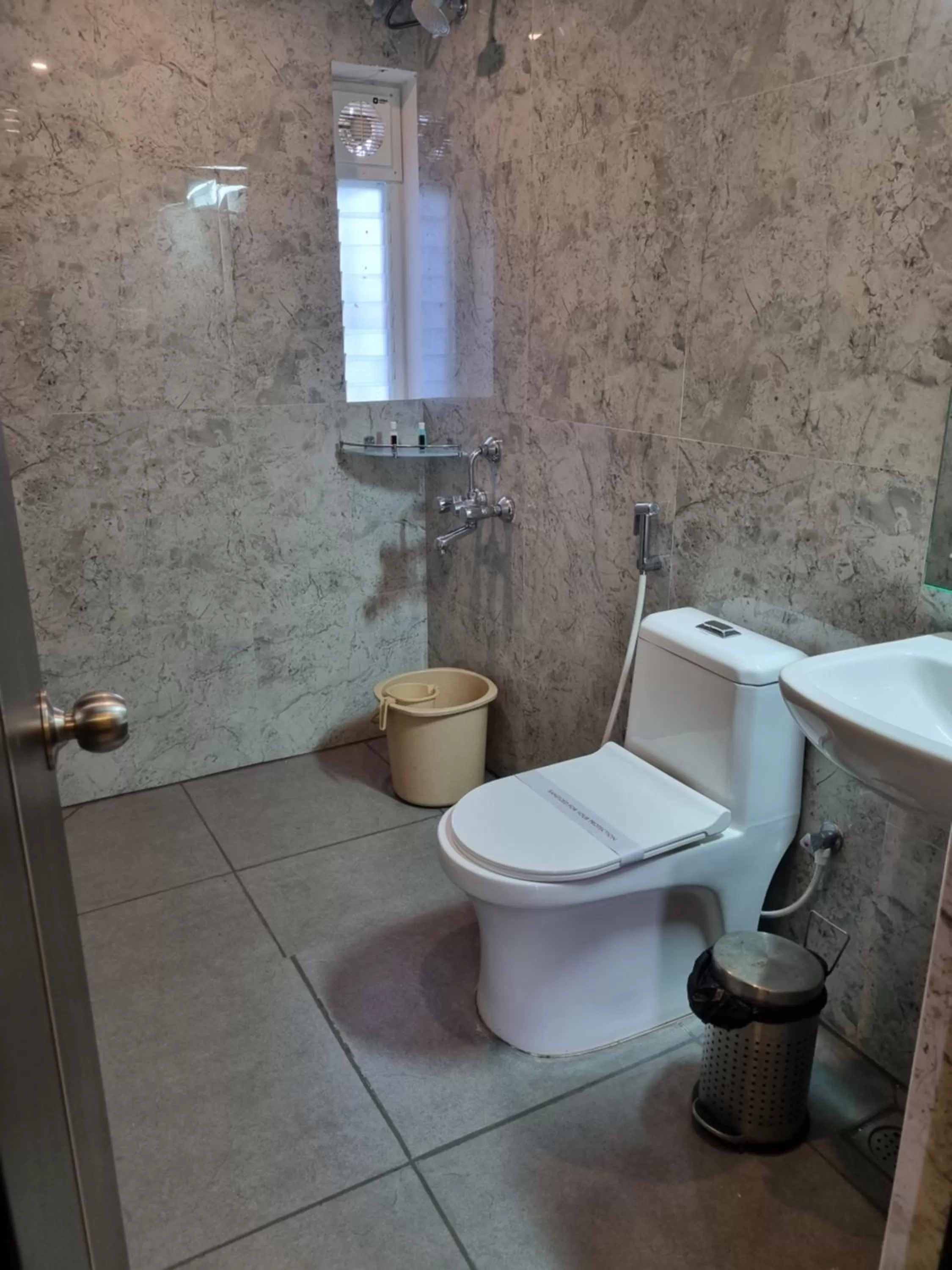 Bathroom in PLUTUS RESIDENCY