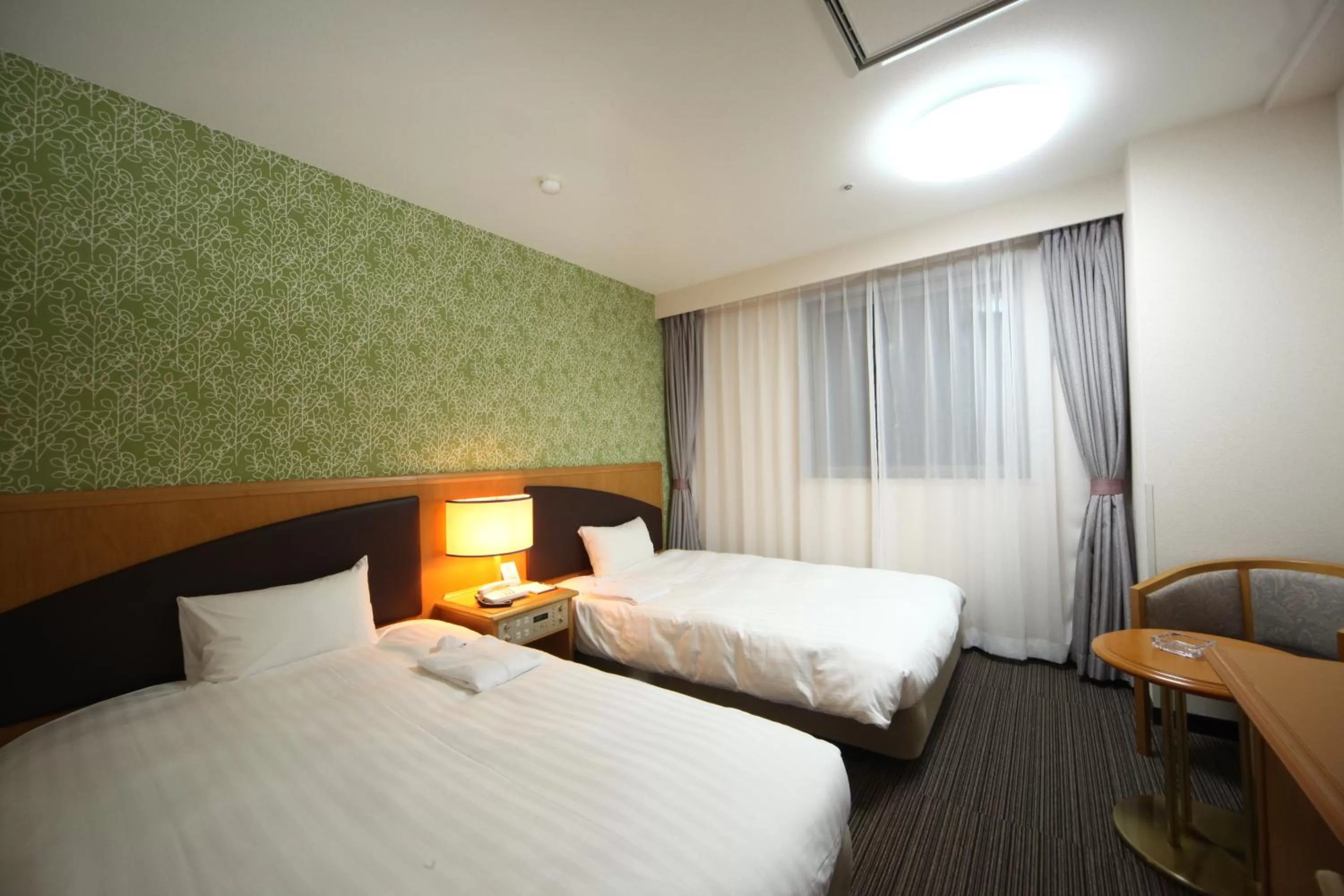 Photo of the whole room, Bed in Hotel Wing International Tomakomai