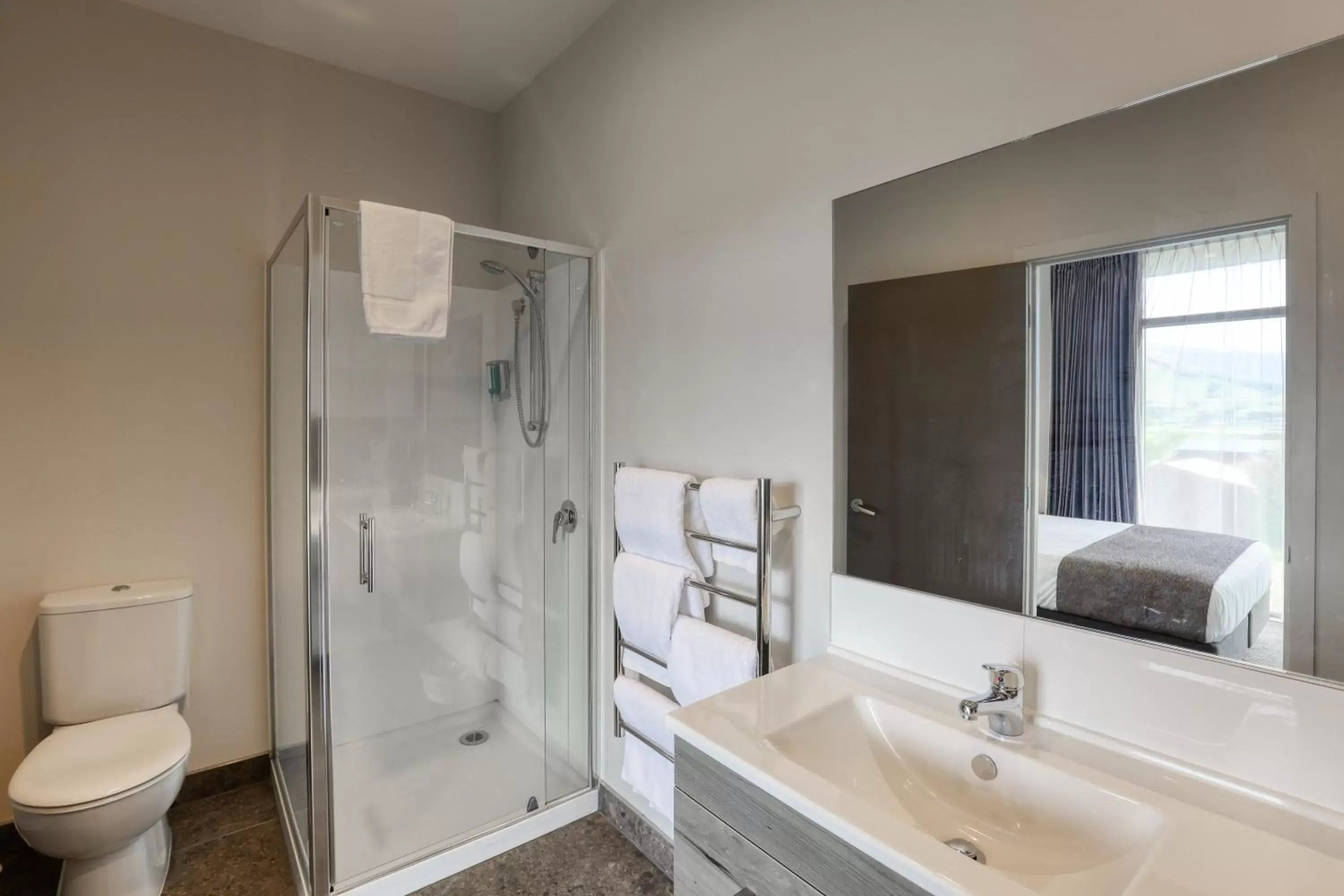 Bathroom in Ramada Suites by Wyndham Queenstown Remarkables Park