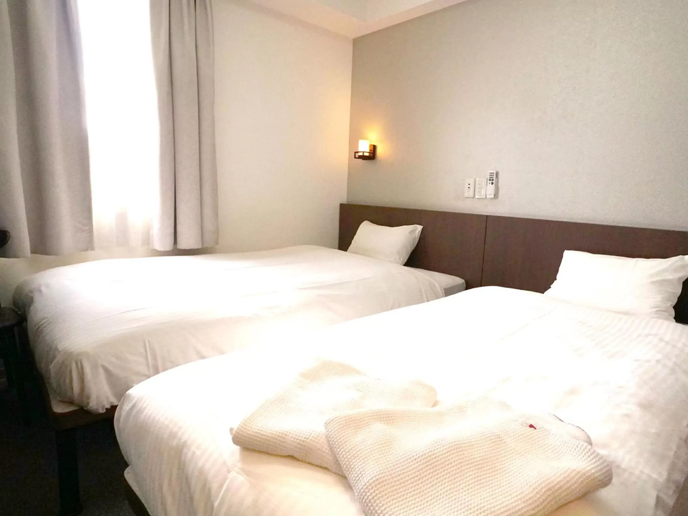 Bed in Hotel Wing International Himeji