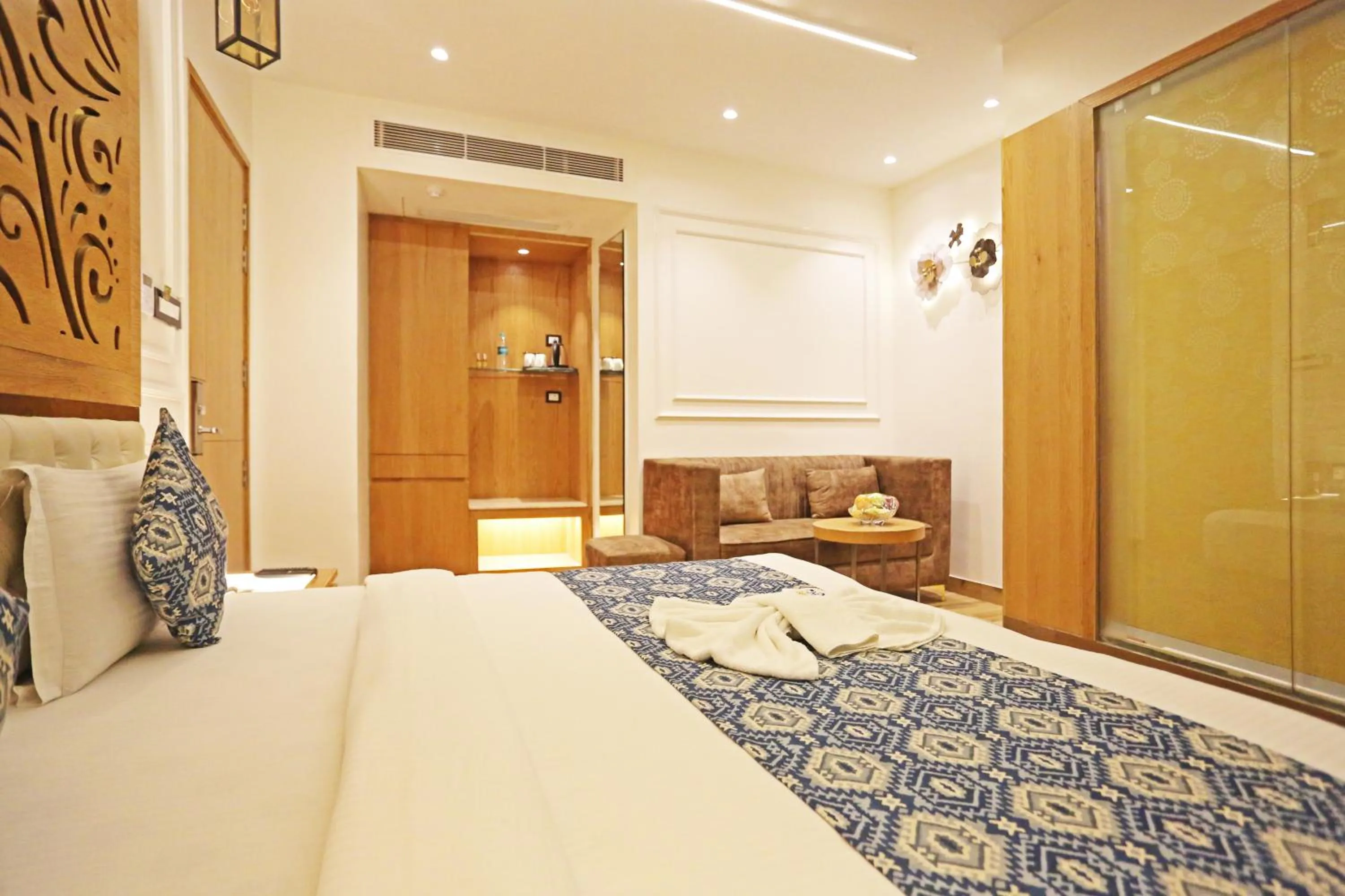 Bed in JRD Luxury-Business Hotel