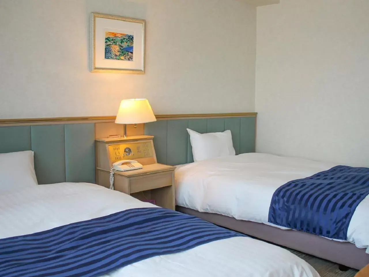 Bed in HOTEL LiVEMAX BUDGET Kagoshima