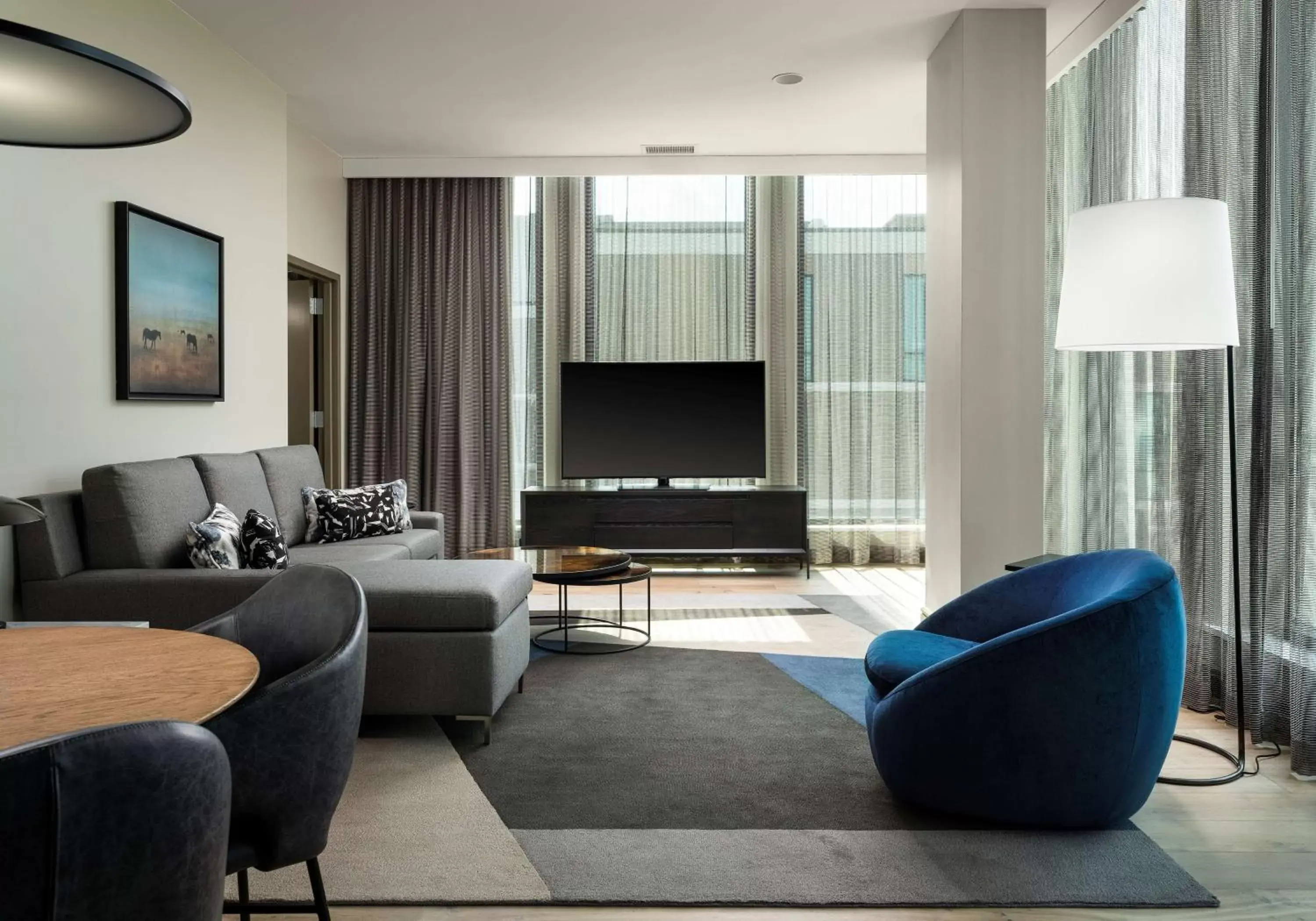 Living room, Seating Area in The Highland Dallas, Curio Collection by Hilton