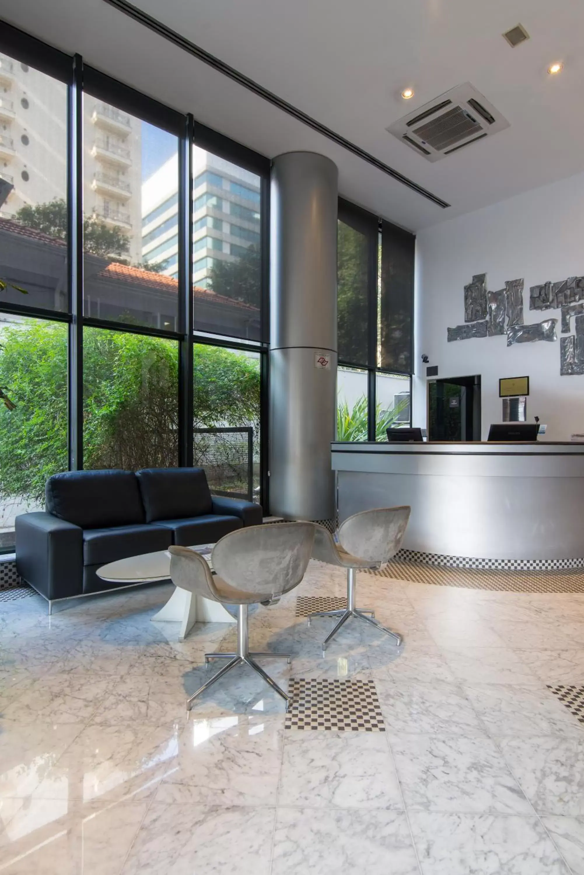 Communal lounge/ TV room in Intercity Interative São Paulo Jardins