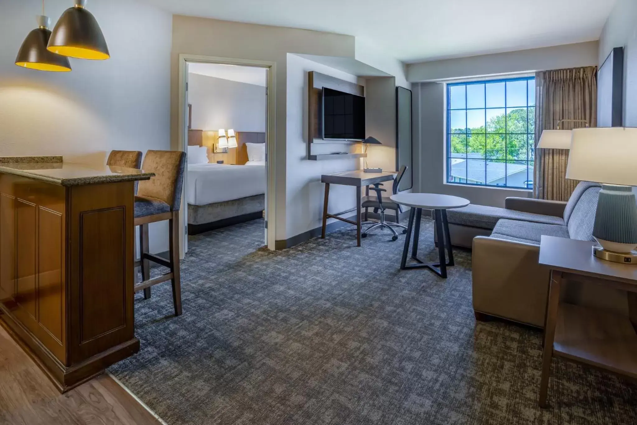 Photo of the whole room, Seating Area in Staybridge Suites Wilmington East, an IHG Hotel