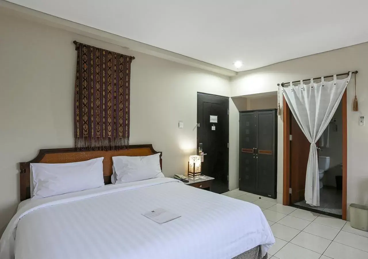 Bed in The Jayakarta Suites Komodo Flores