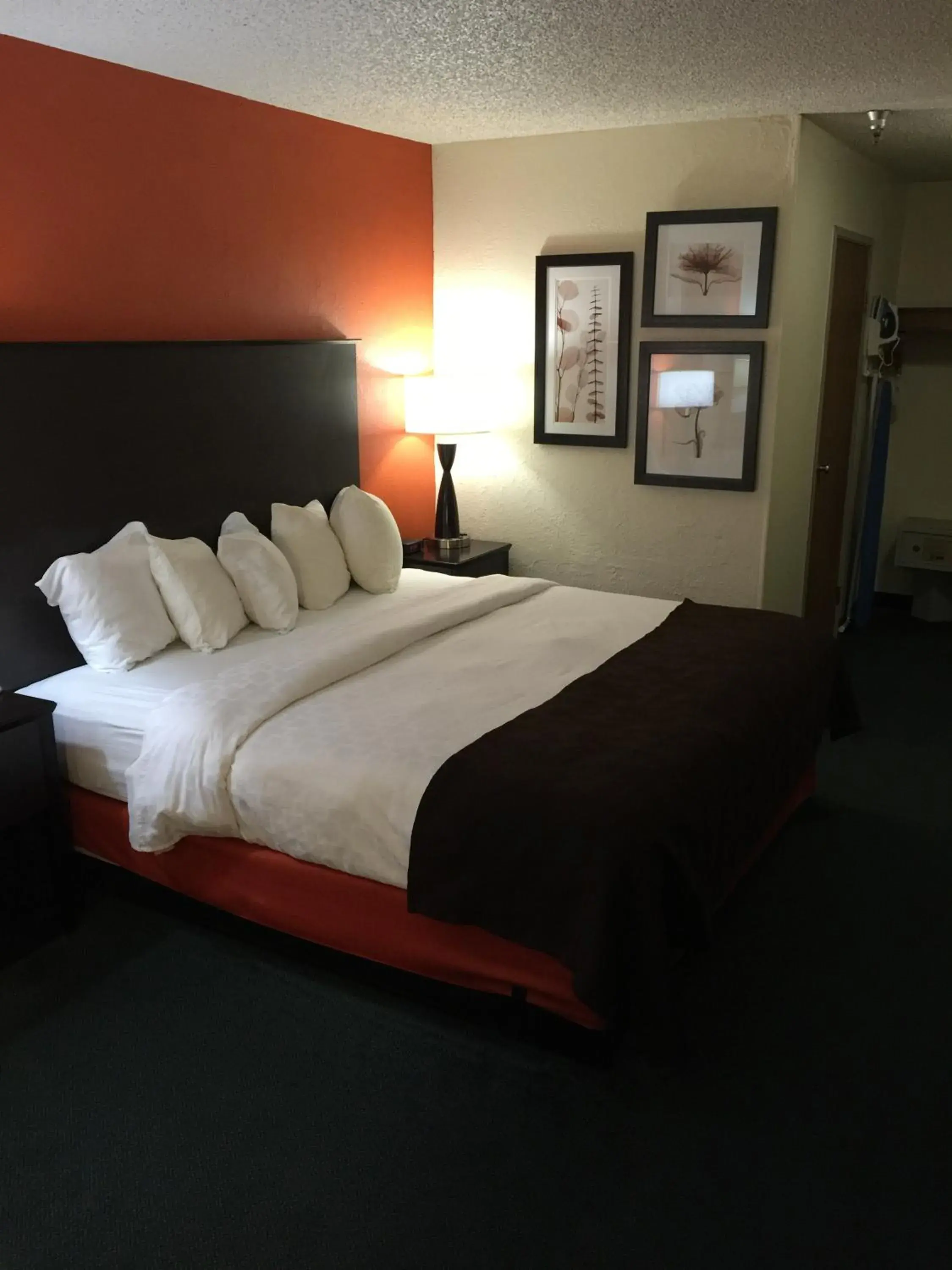 Bed in AmericInn by Wyndham Salina