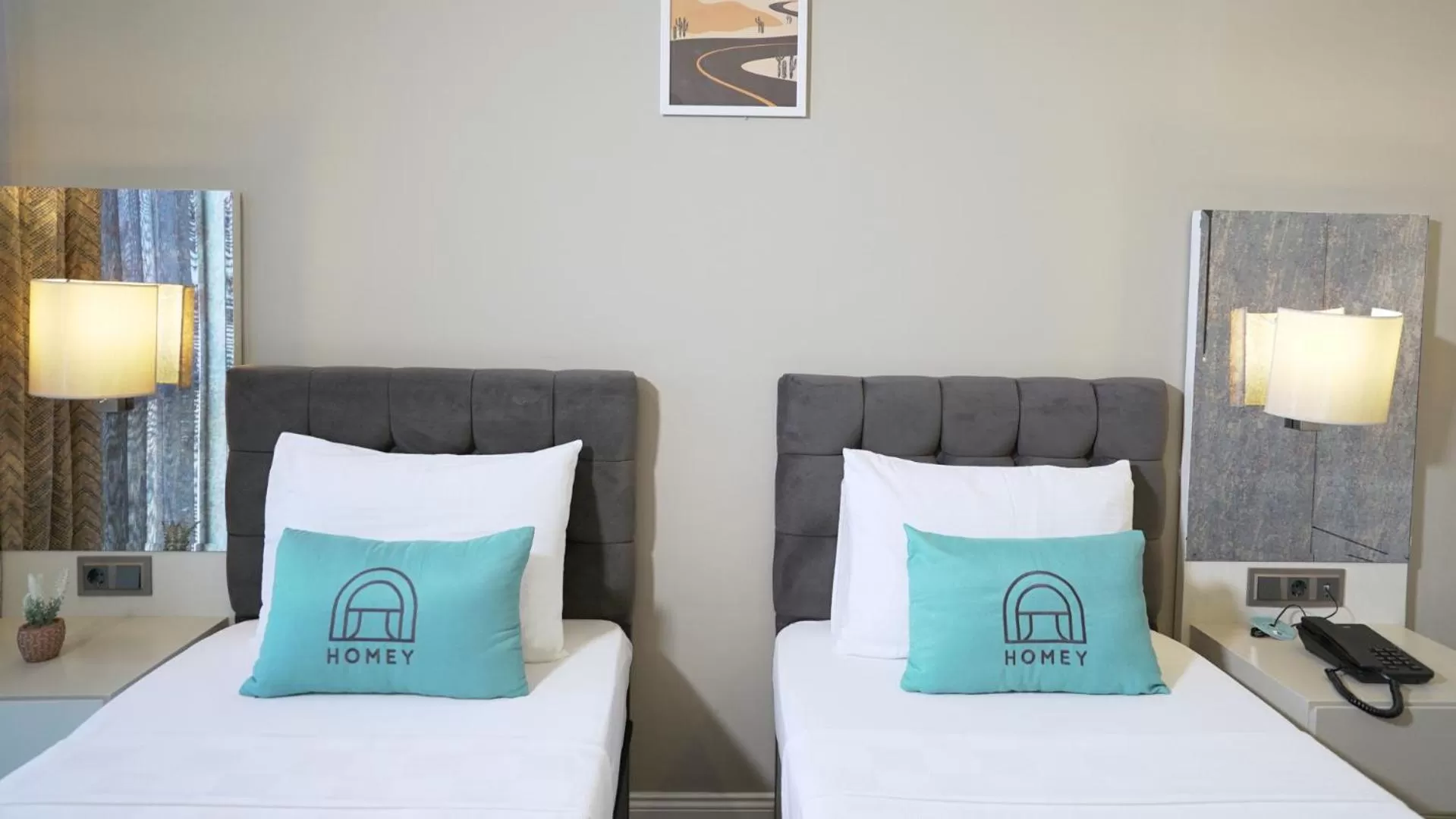 Bed in Homey AirPort Hotel