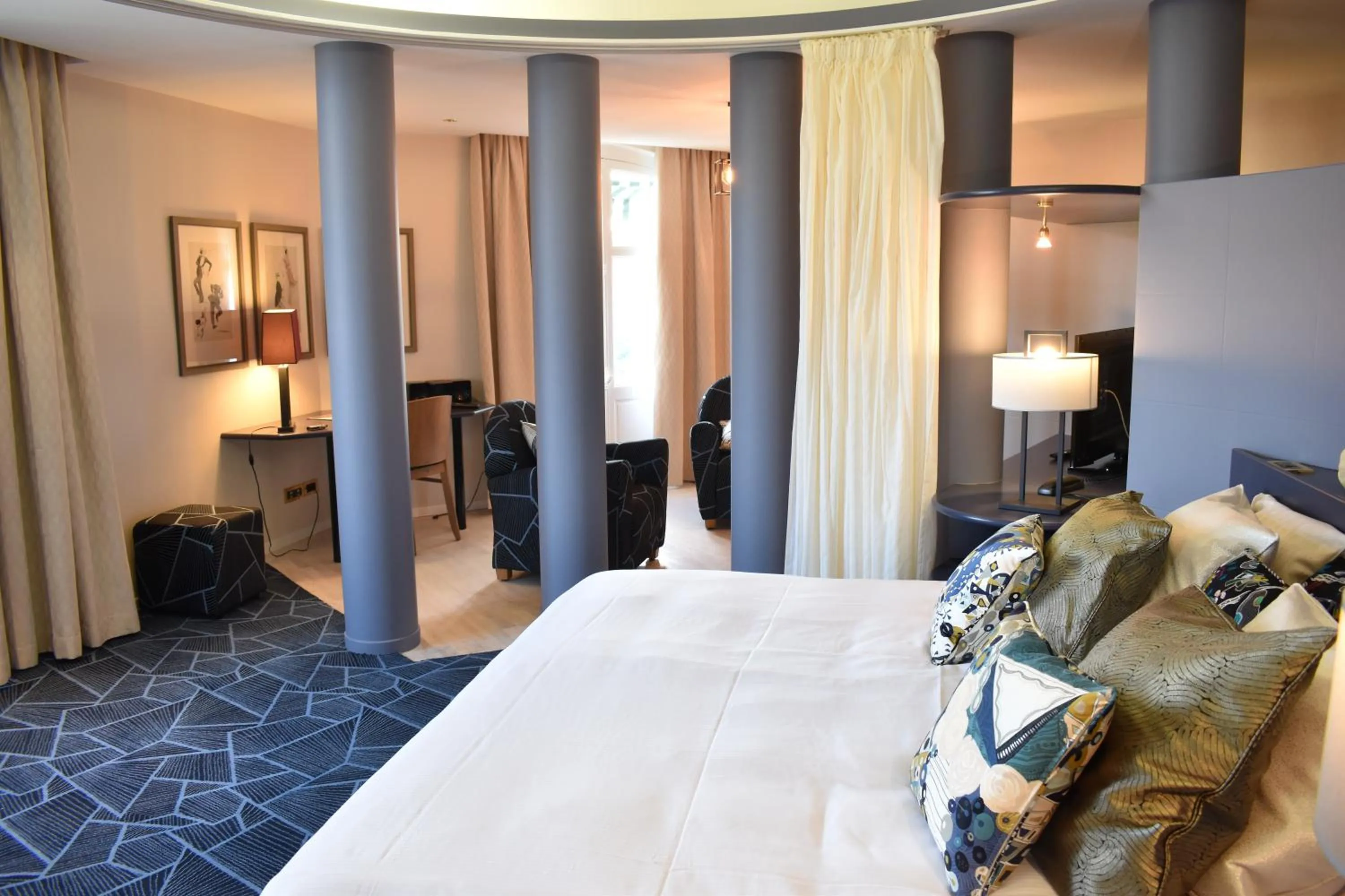 Bed in Logis Les Loges du Parc