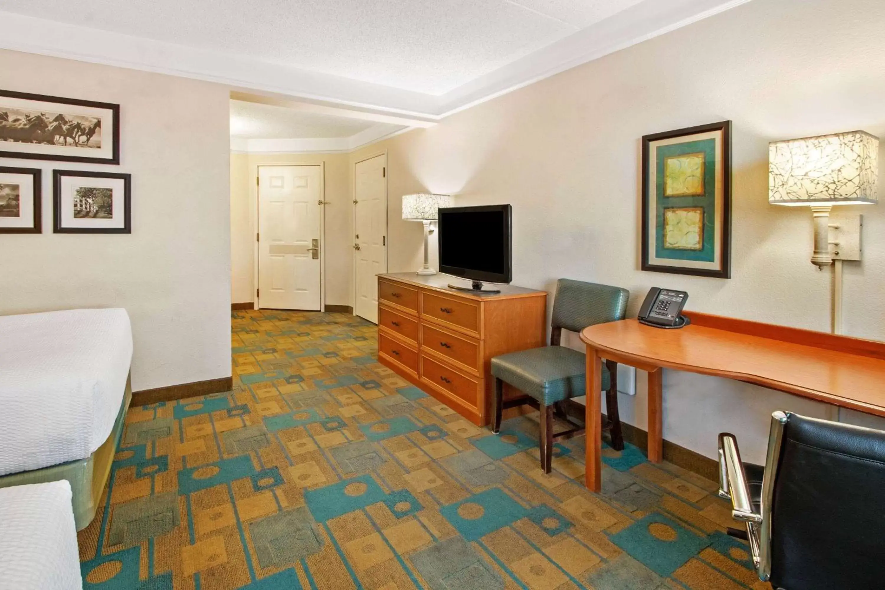 Photo of the whole room, TV/Entertainment Center in La Quinta by Wyndham Albuquerque West