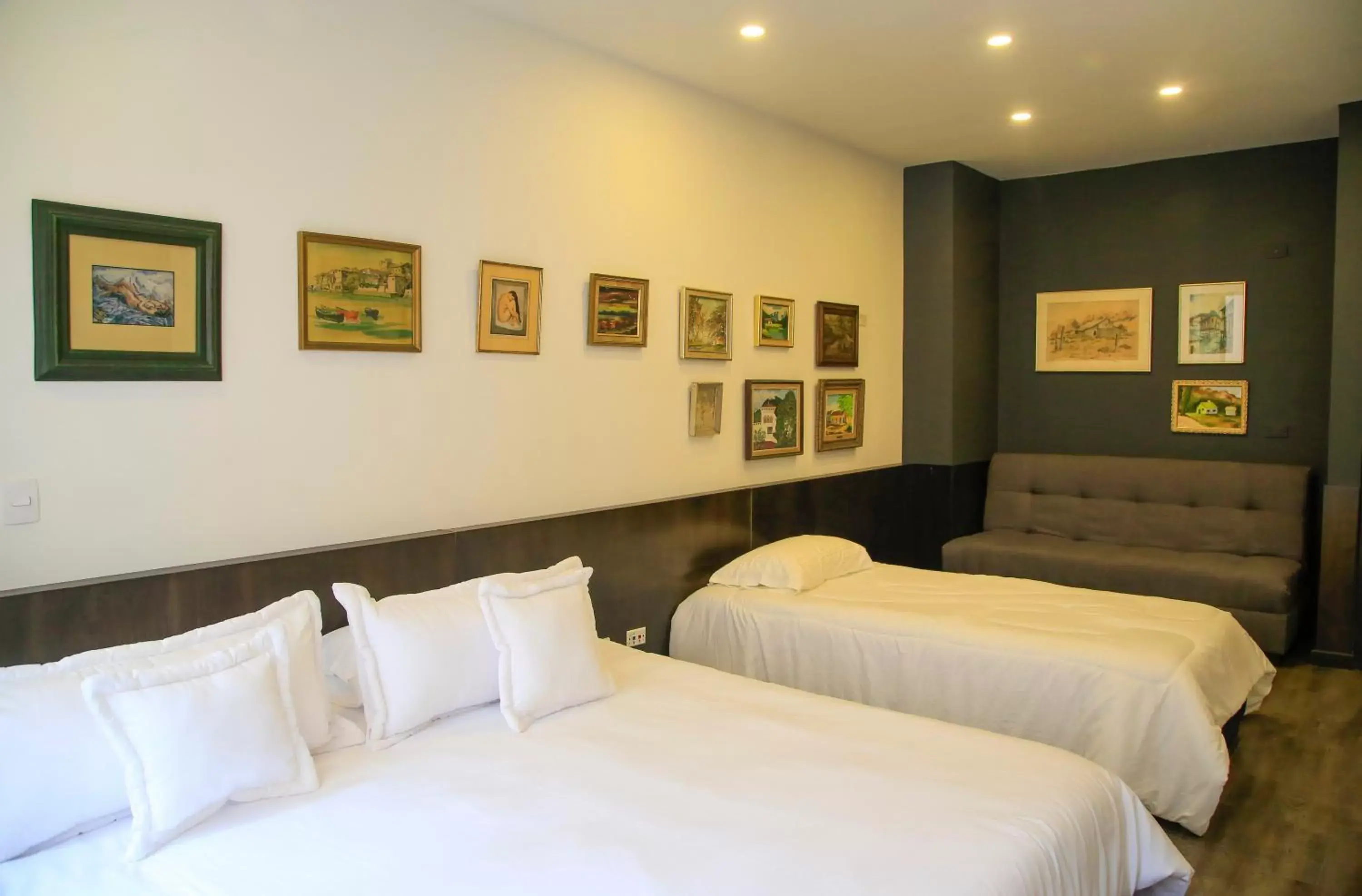 Bed in Hotel Museo San Moritz Bed in Hotel Museo San Moritz