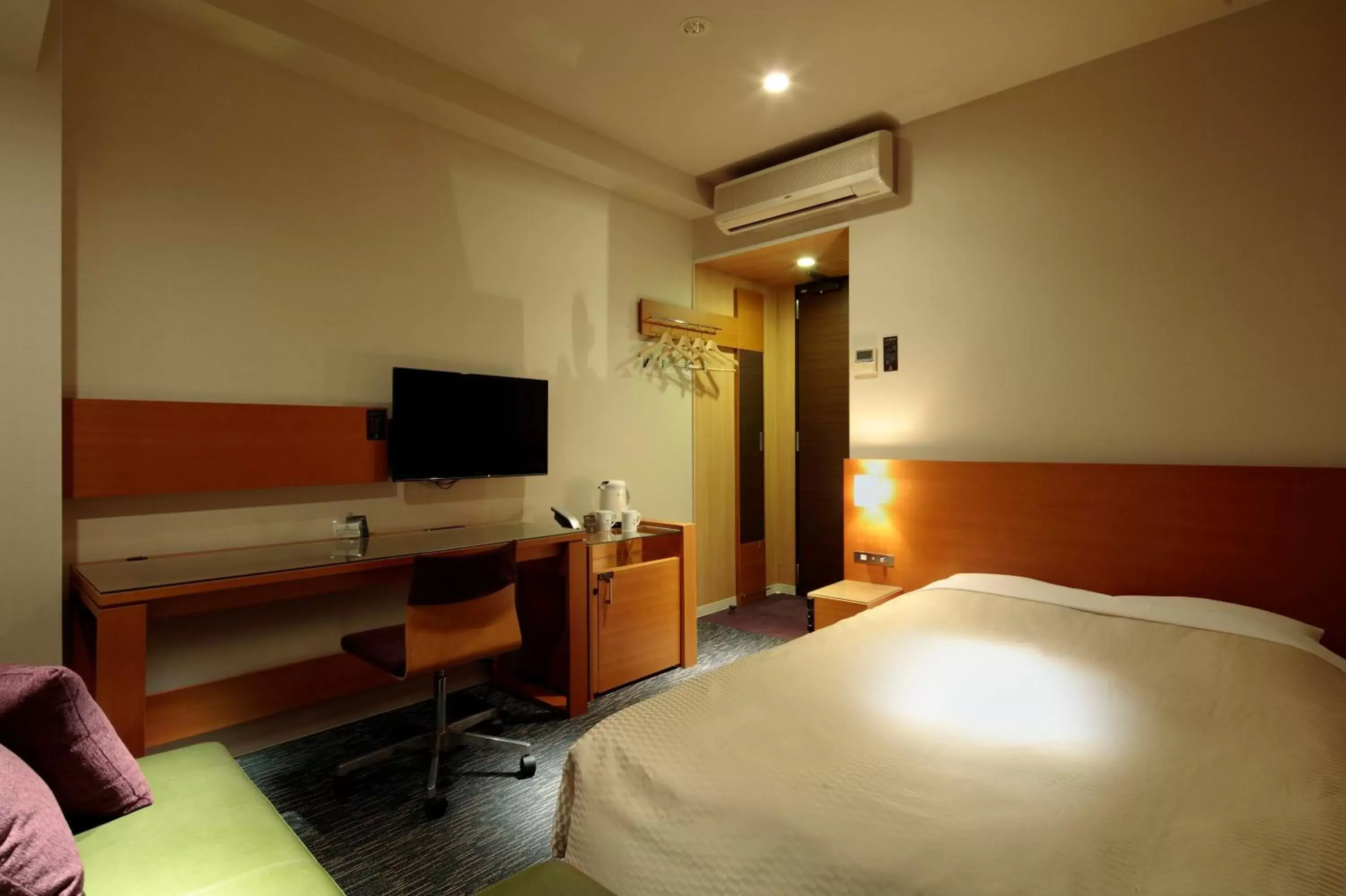 Photo of the whole room, Bed in Candeo Hotels Fukuyama