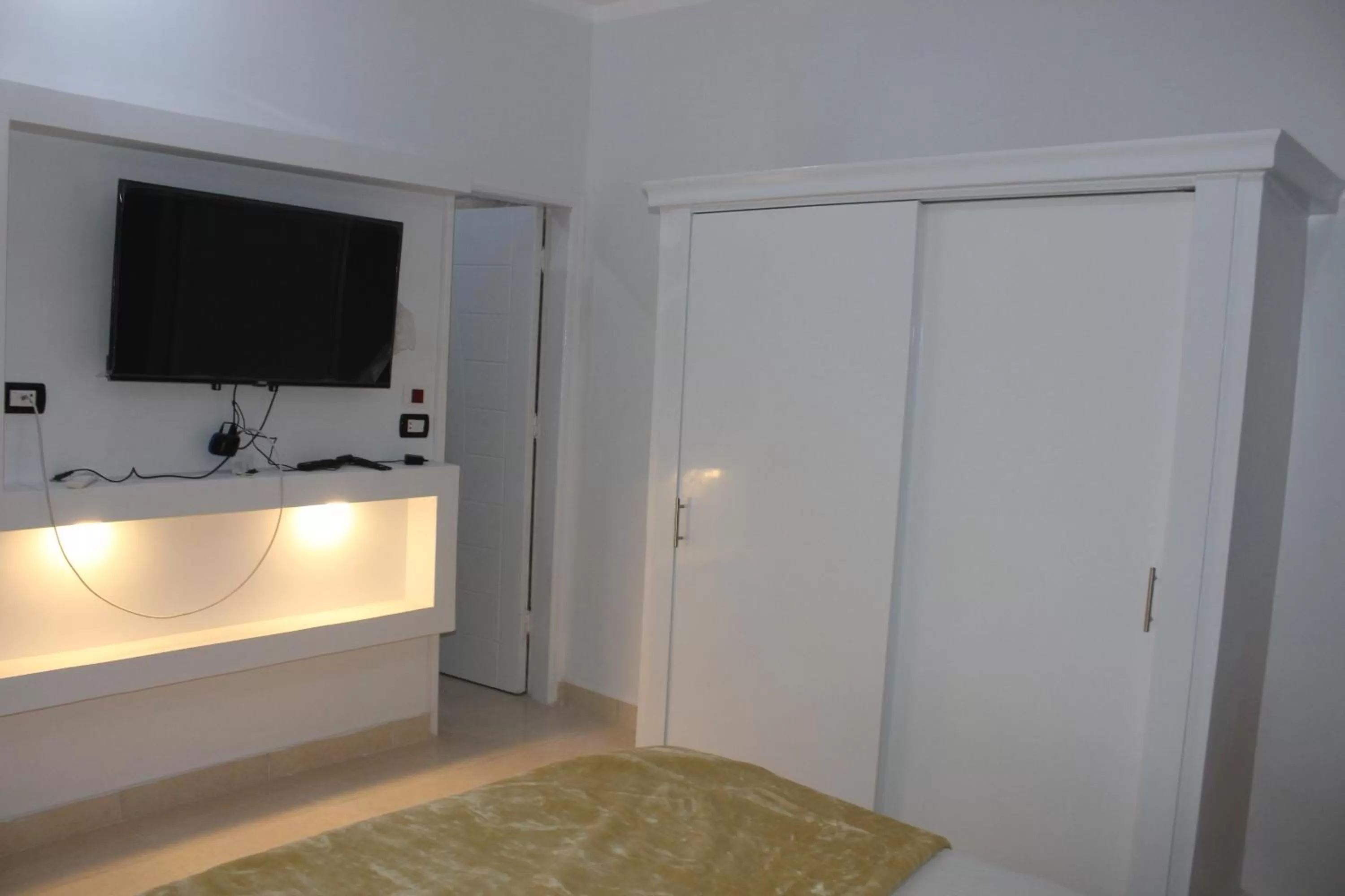 Bed in Mama Africa Apts & Studios