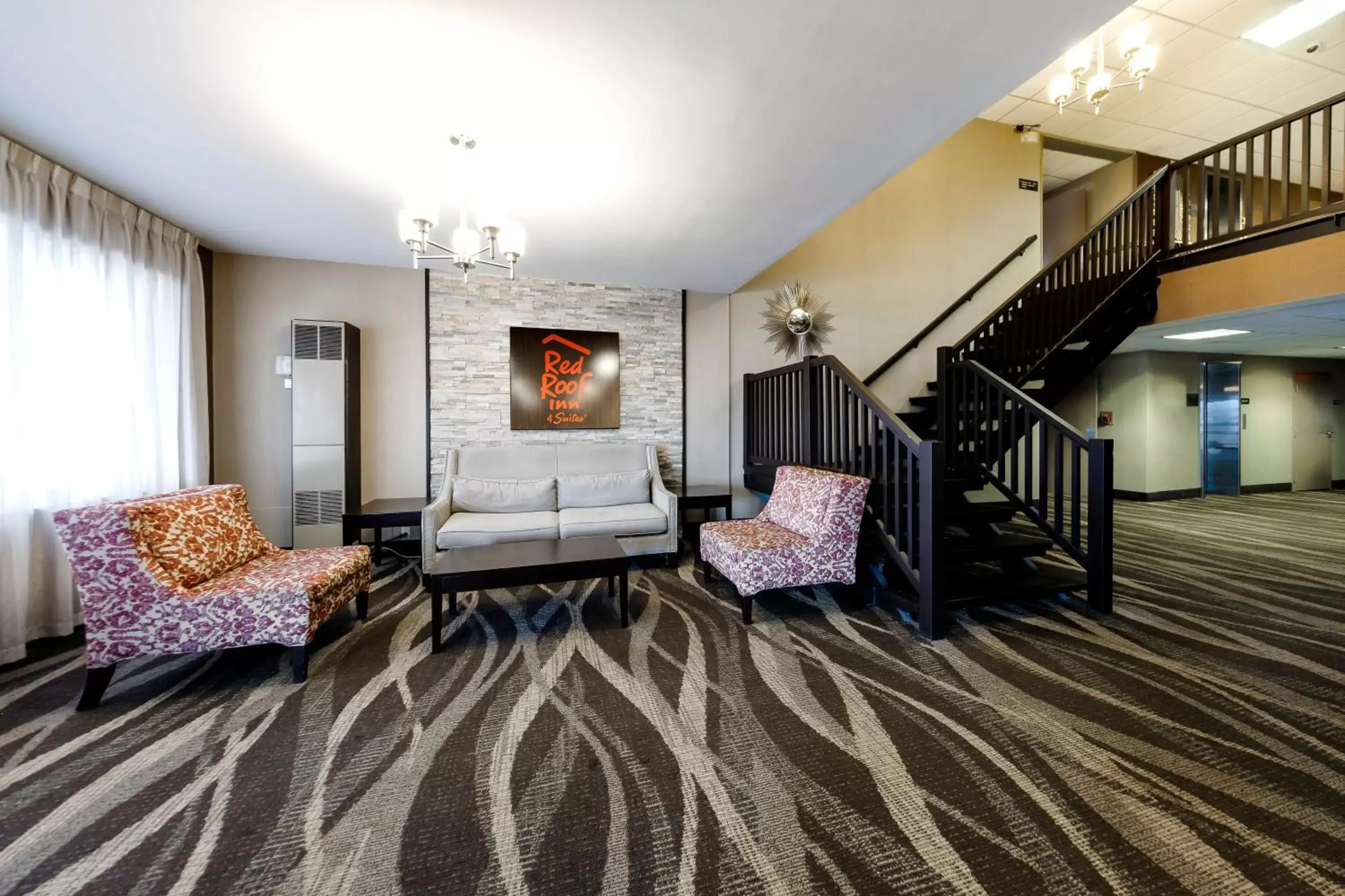 Lobby or reception, Seating Area in Red Roof Inn & Suites Newburgh - Stewart Airport