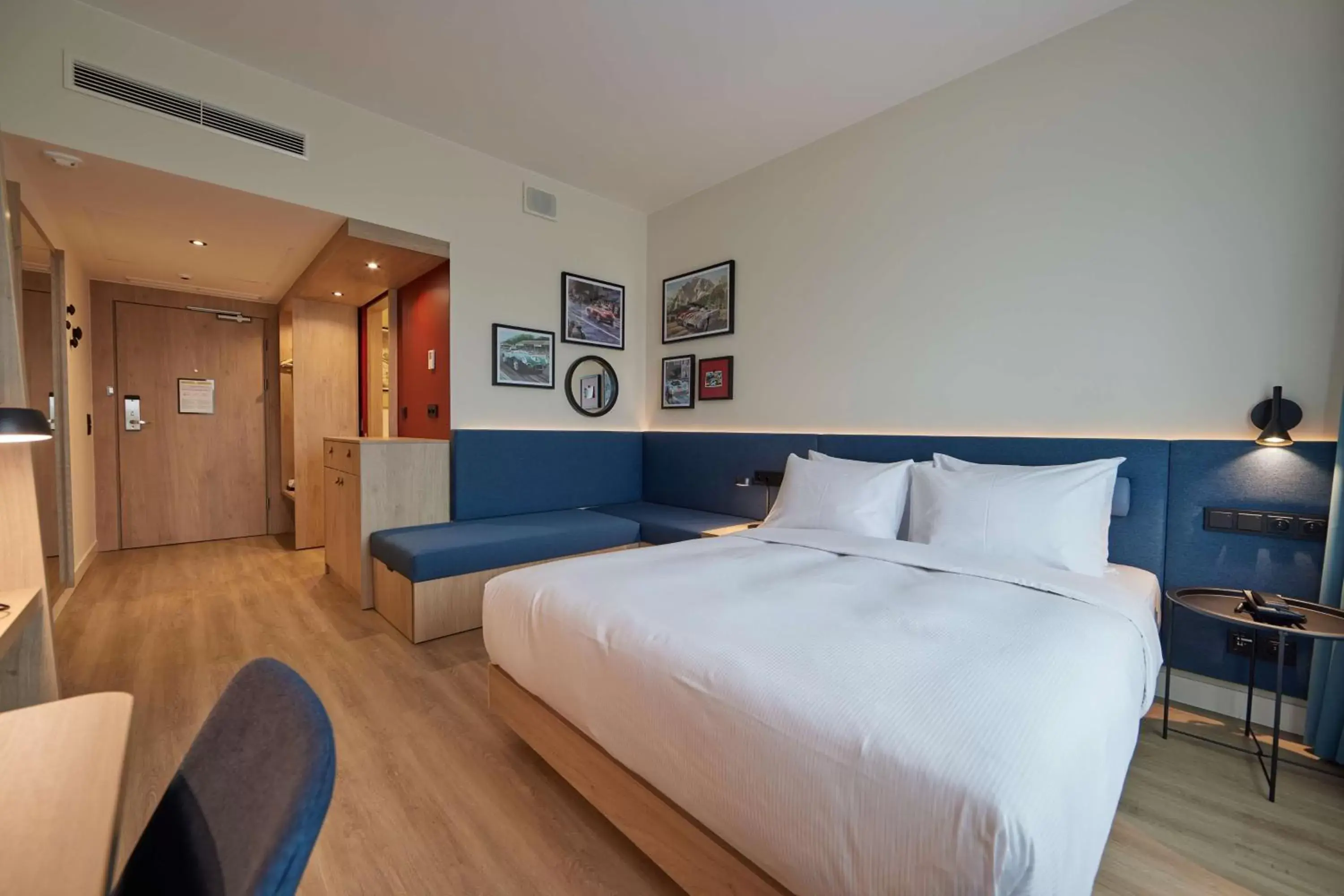 Living room, Bed in Hampton By Hilton Poznan Swarzedz