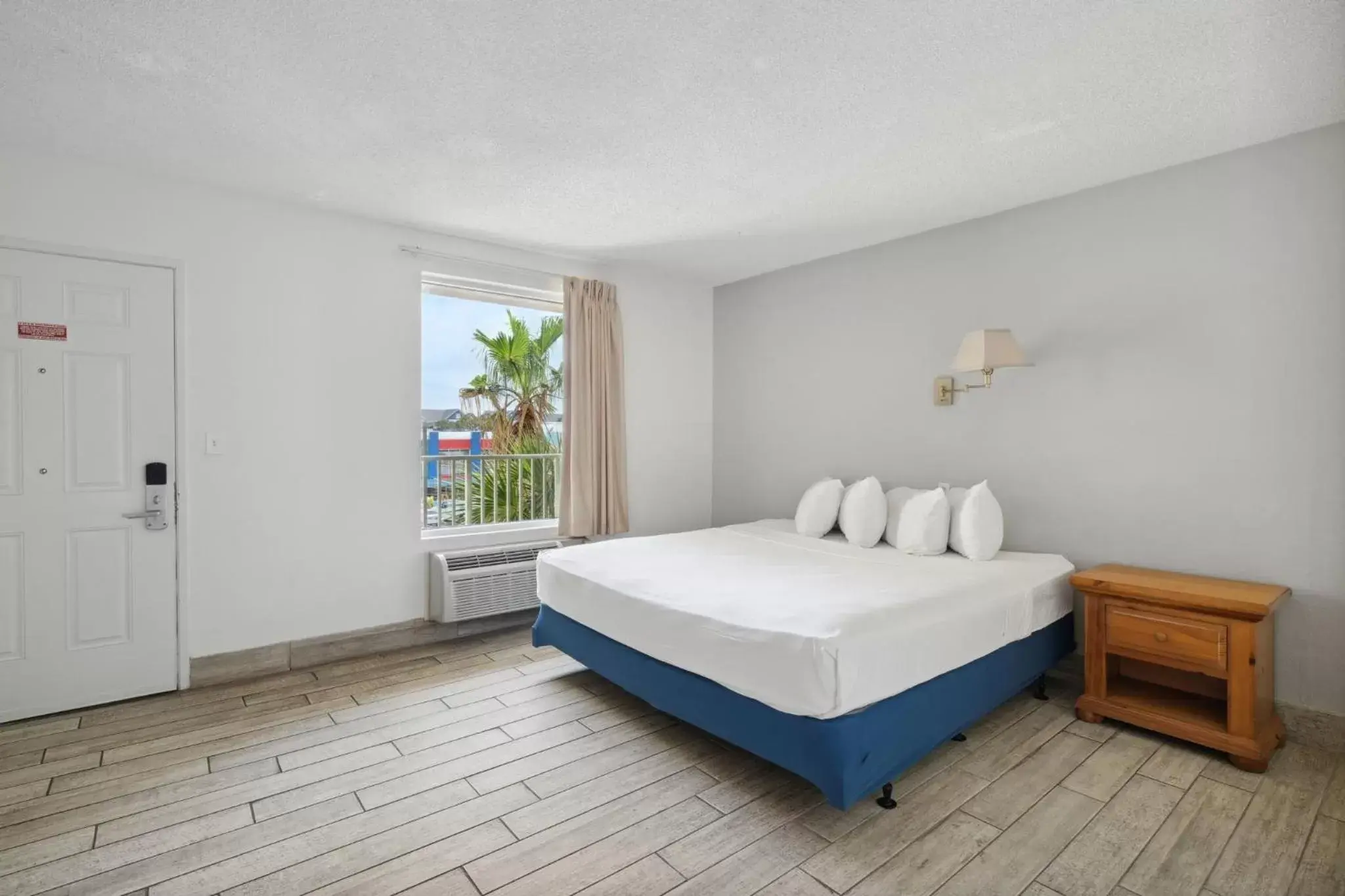 Bedroom, Bed in Holiday Terrace Beachfront Hotel, a By The Sea Resort