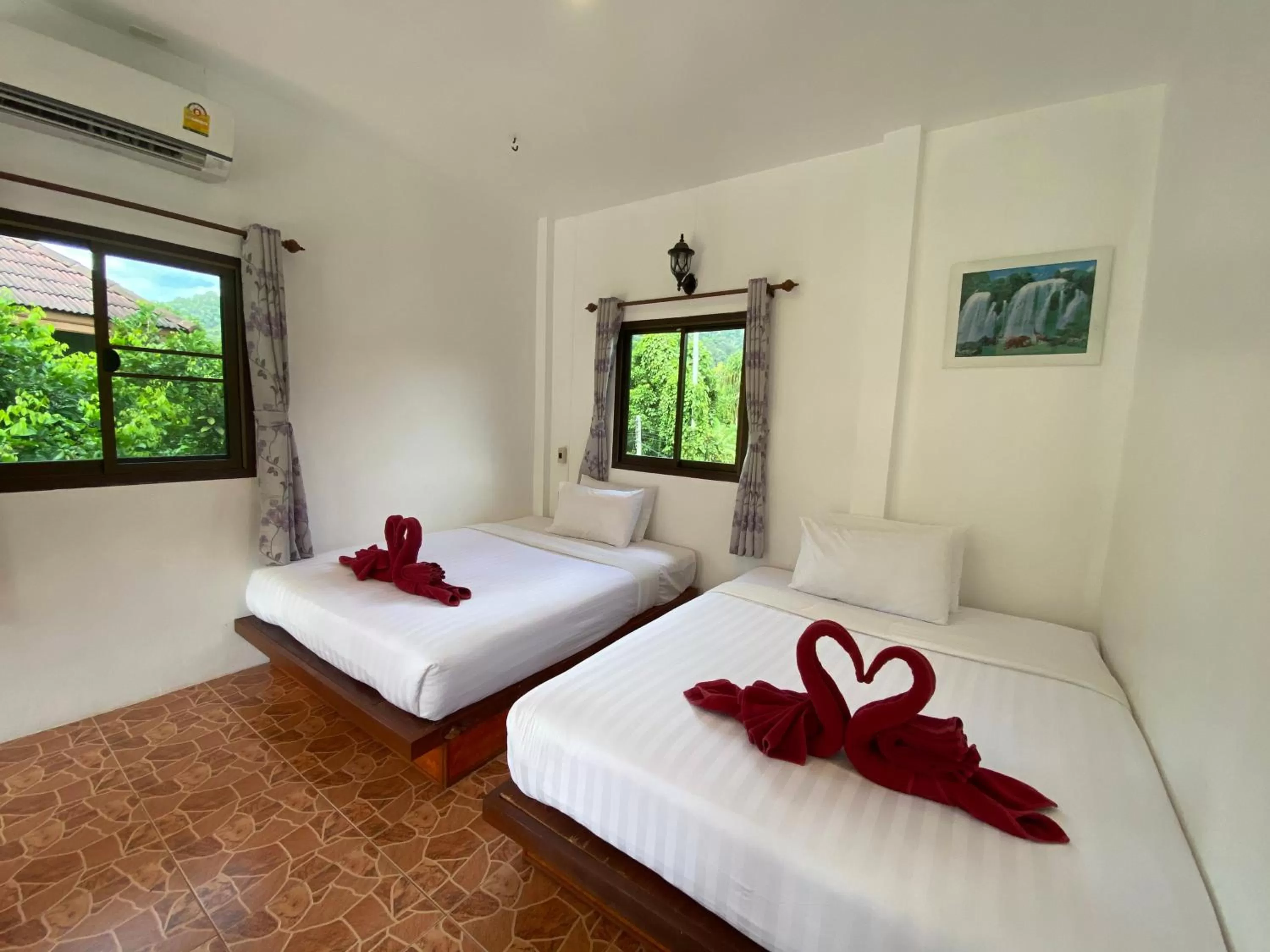 Bed in Khao Sok Jungle Huts Resort