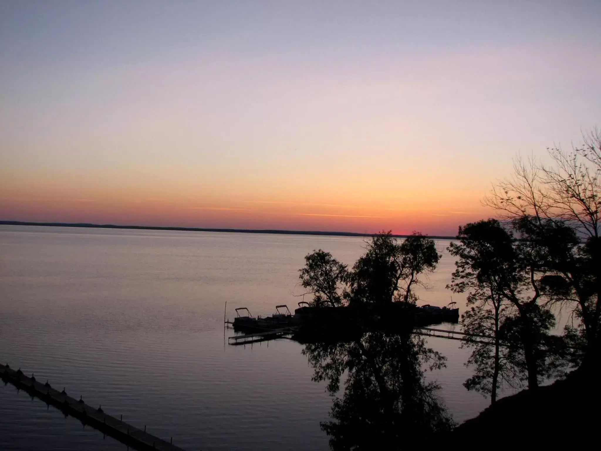 Lake view, Sunrise/Sunset in Beachfront Hotel Houghton Lake