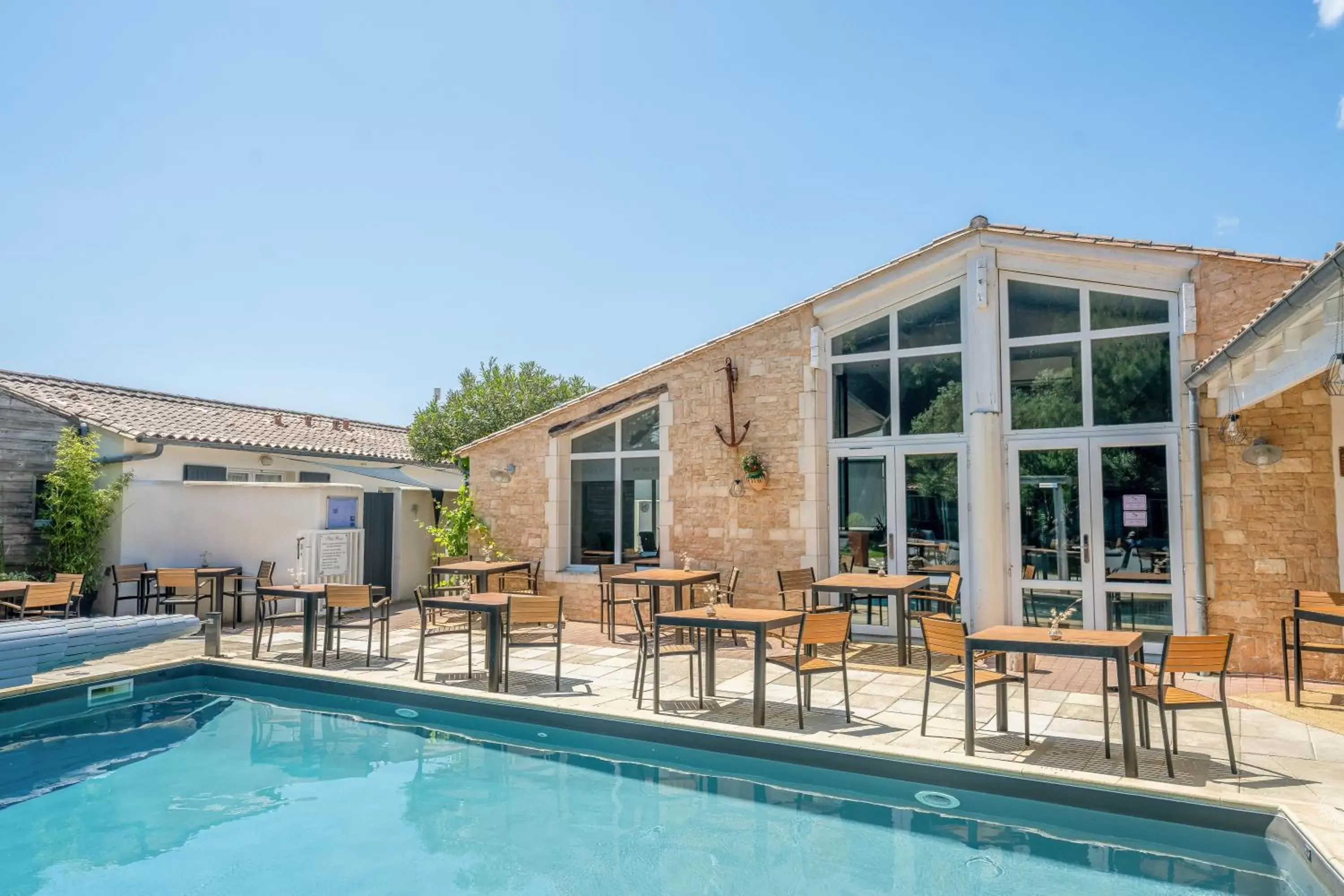 Property building, Swimming Pool in Hôtel Restaurant & Spa Plaisir