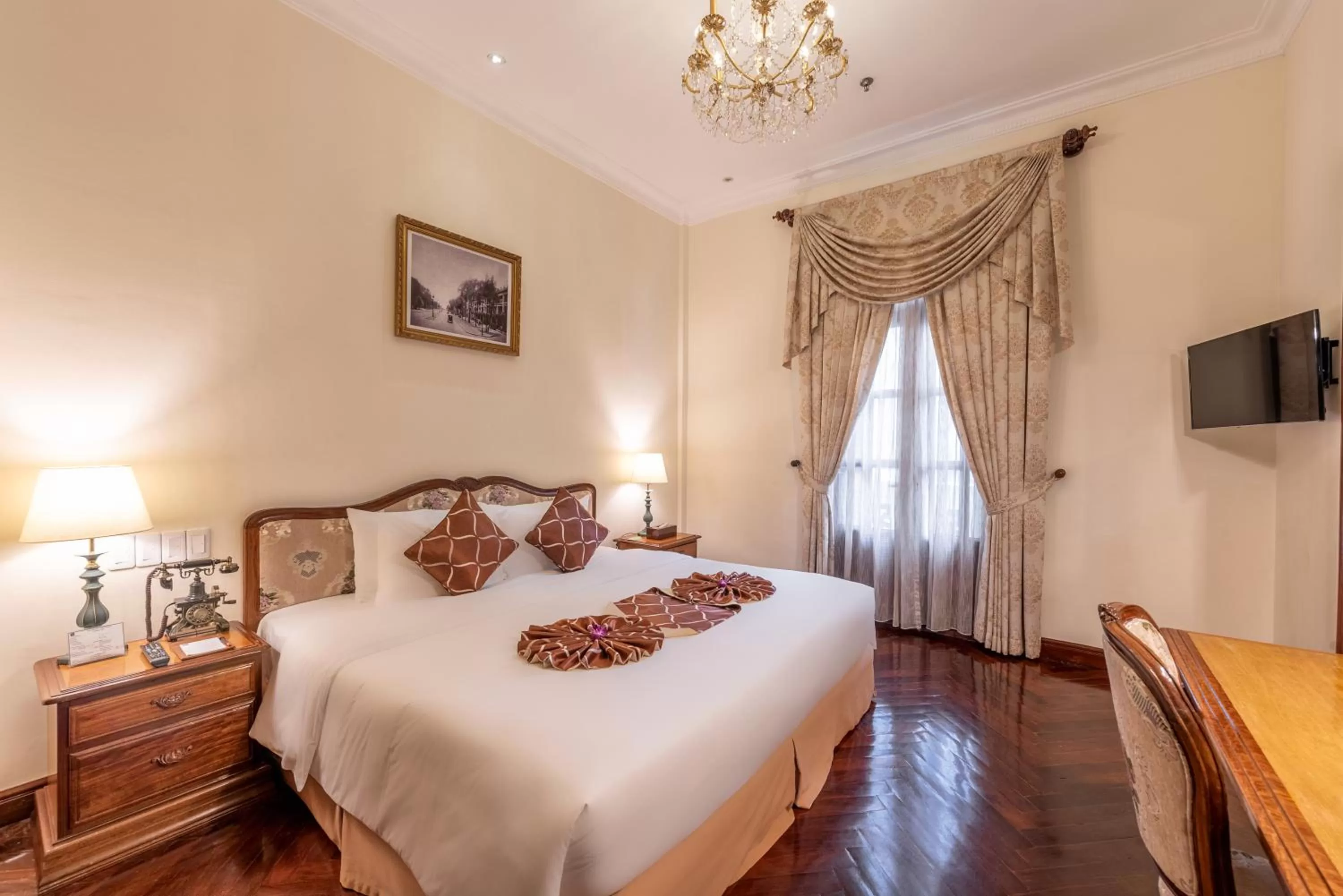 Photo of the whole room, Bed in Hotel Grand Saigon