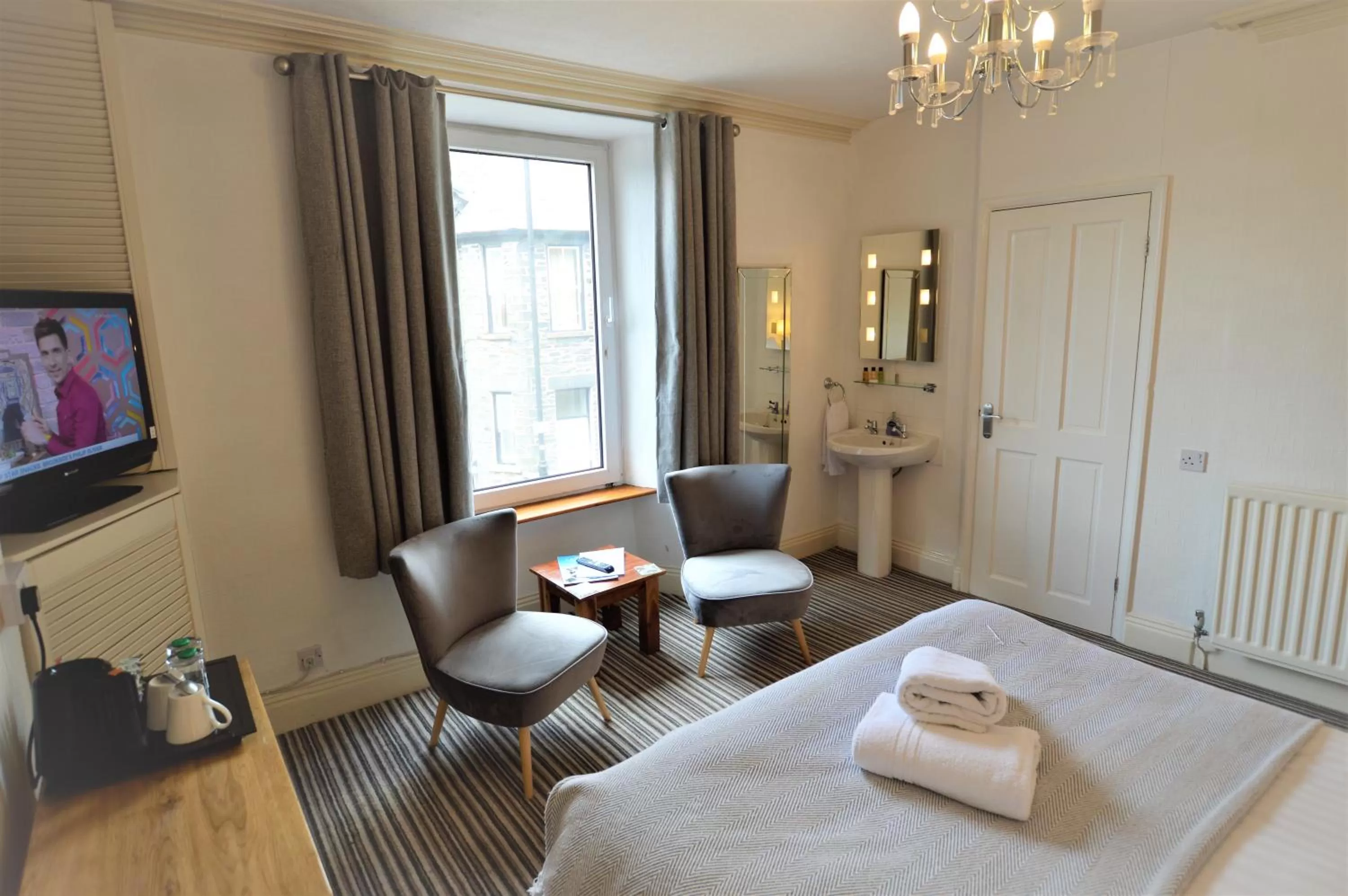 Photo of the whole room, Seating Area in All Seasons Guest House