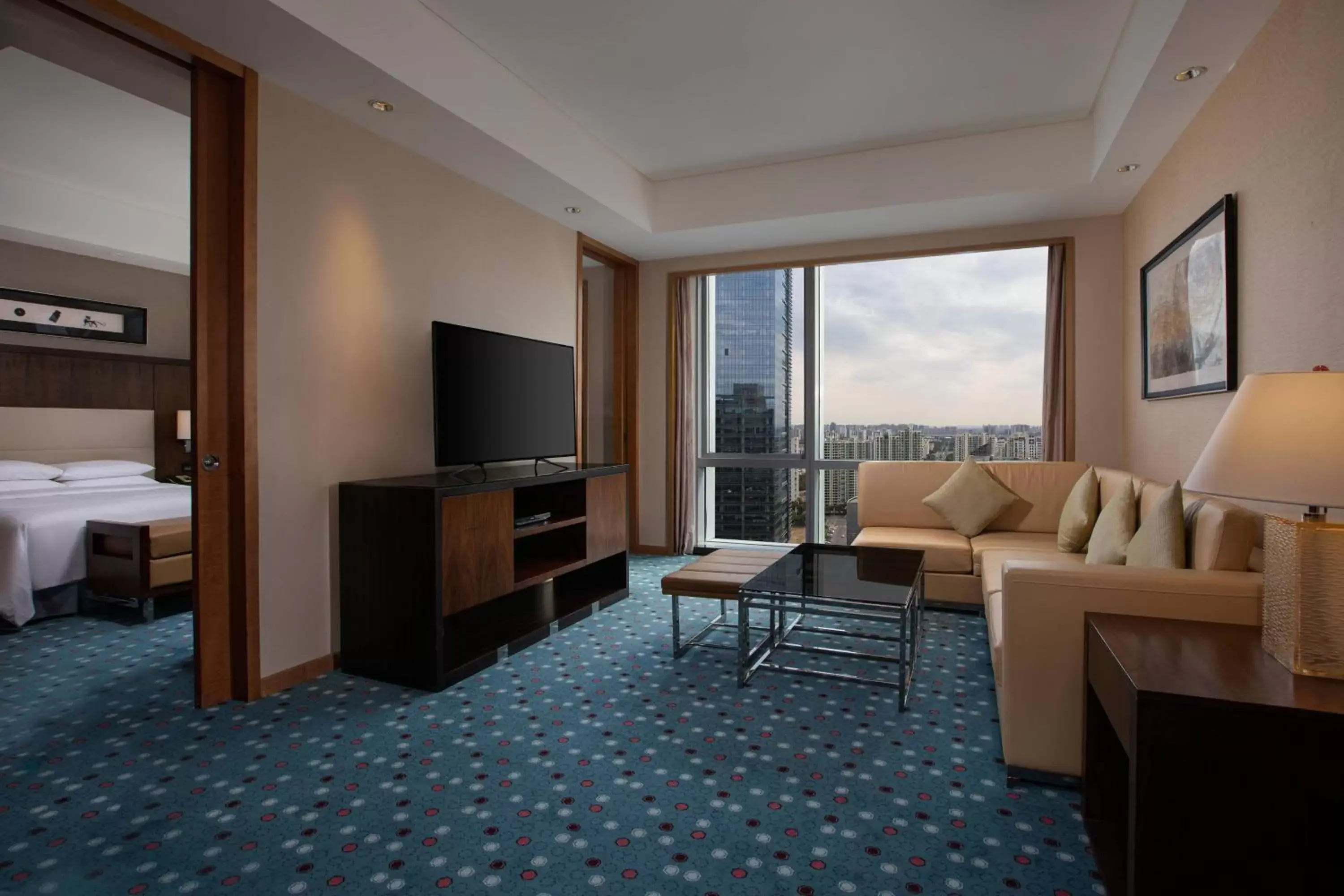 Living room, TV/Entertainment Center in Courtyard by Marriott Suzhou