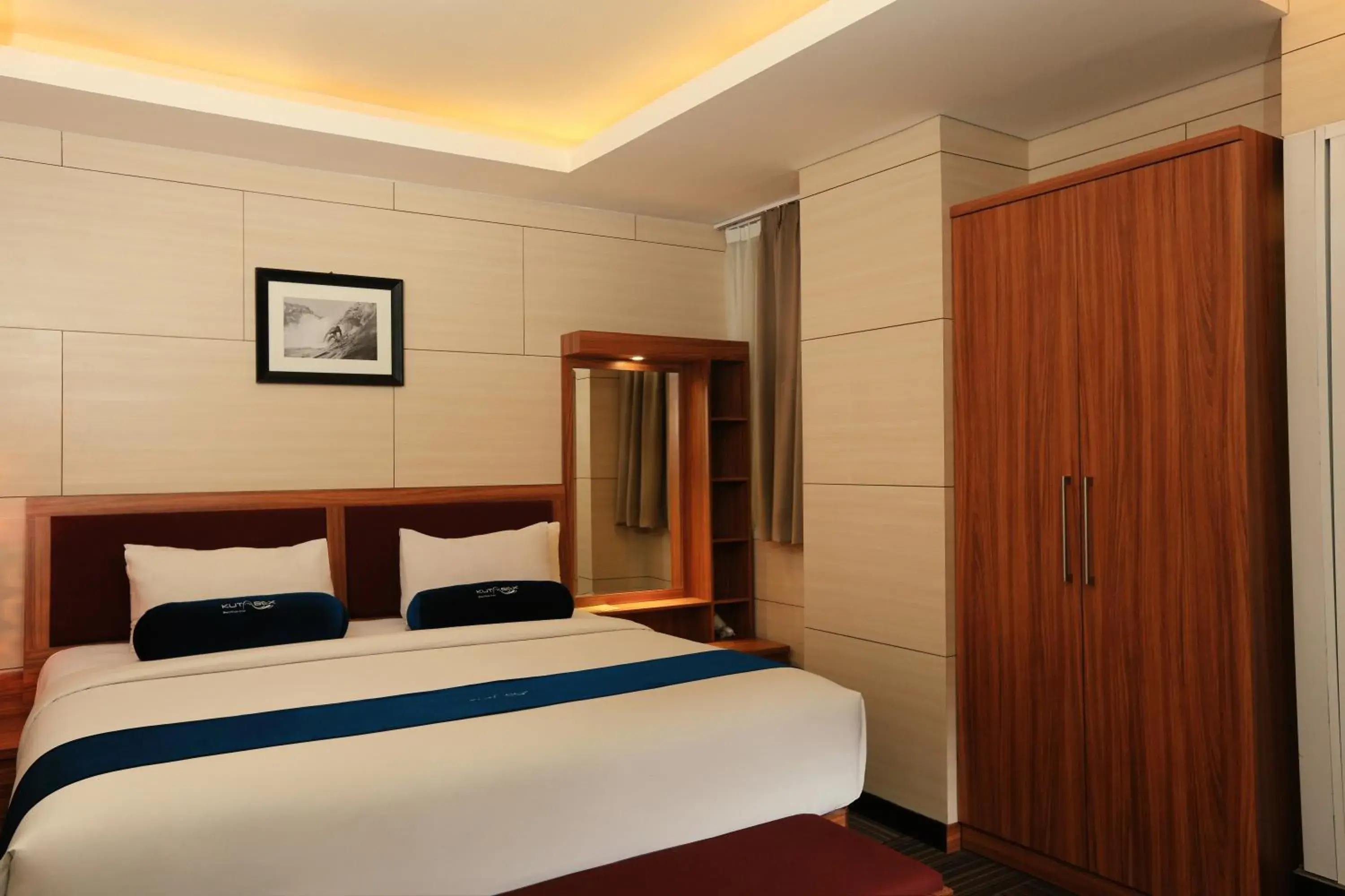 Bed in Kutabex Beachfront Hotel