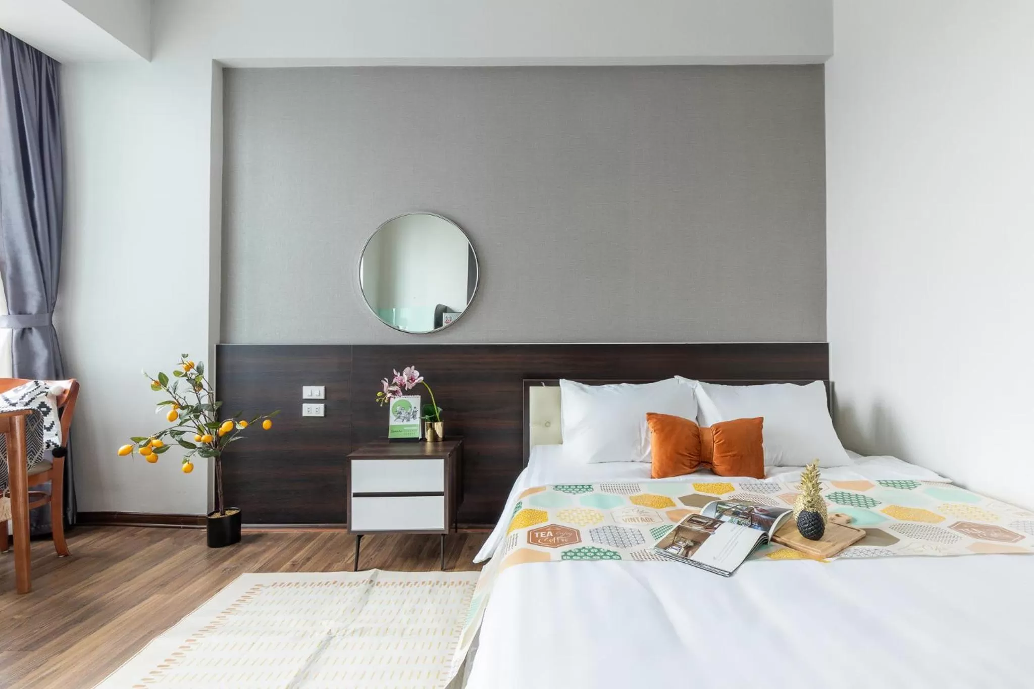 Bed in Ivy Hotel & Apartment