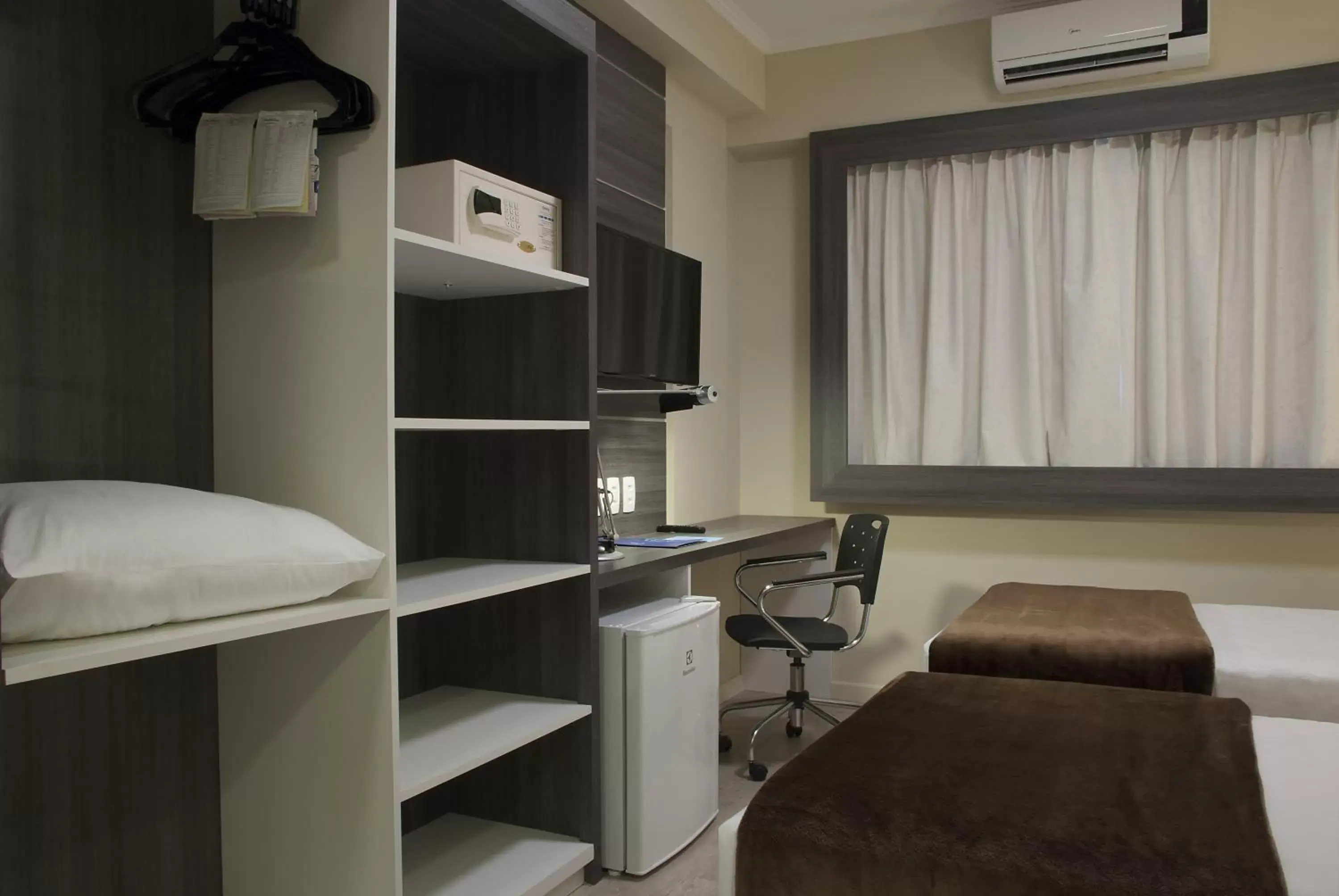 Bedroom, Kitchen/Kitchenette in Master Express Dom Pedro II - Aeroporto