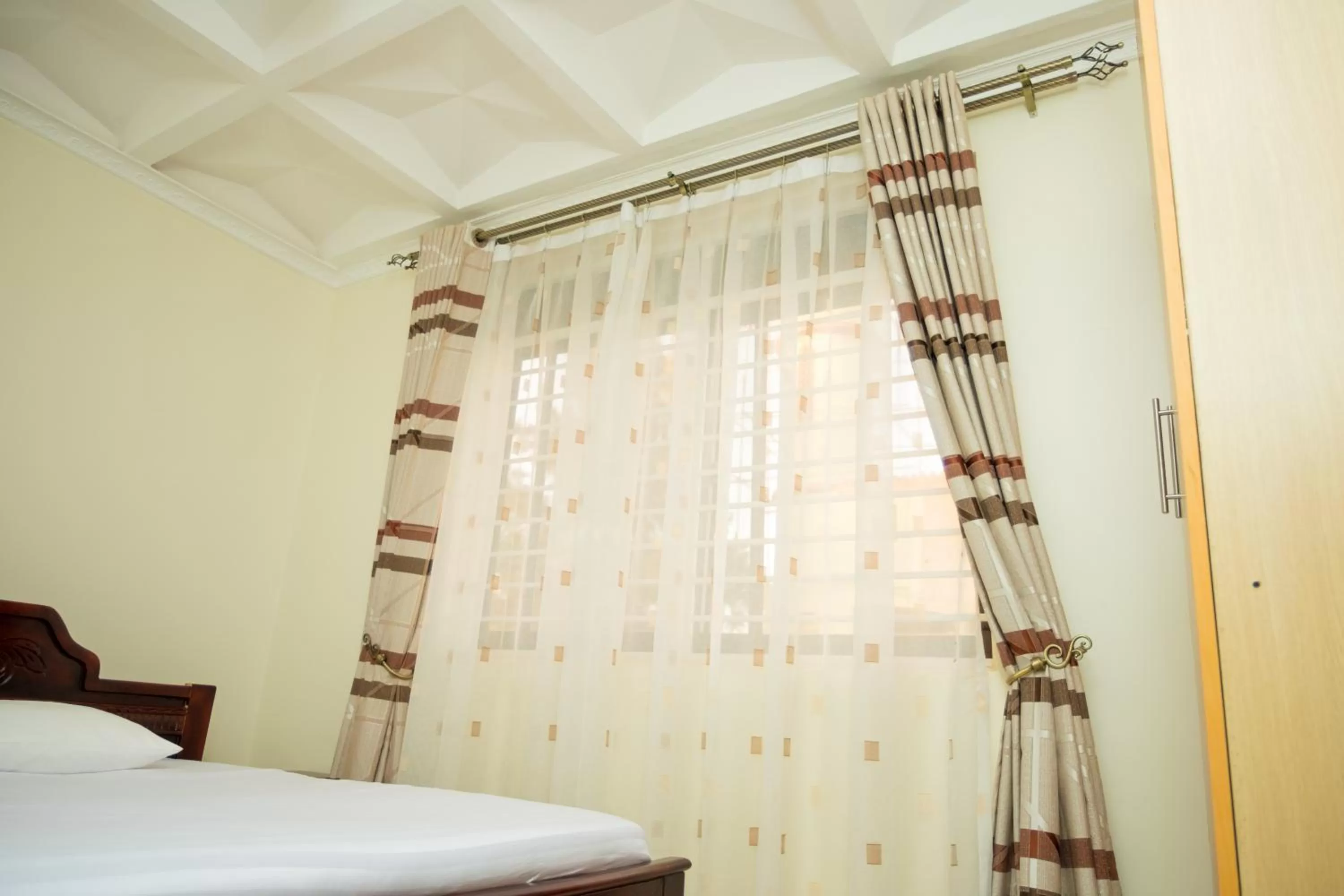 Photo of the whole room, Bed in Kampala Suburbs Apartment