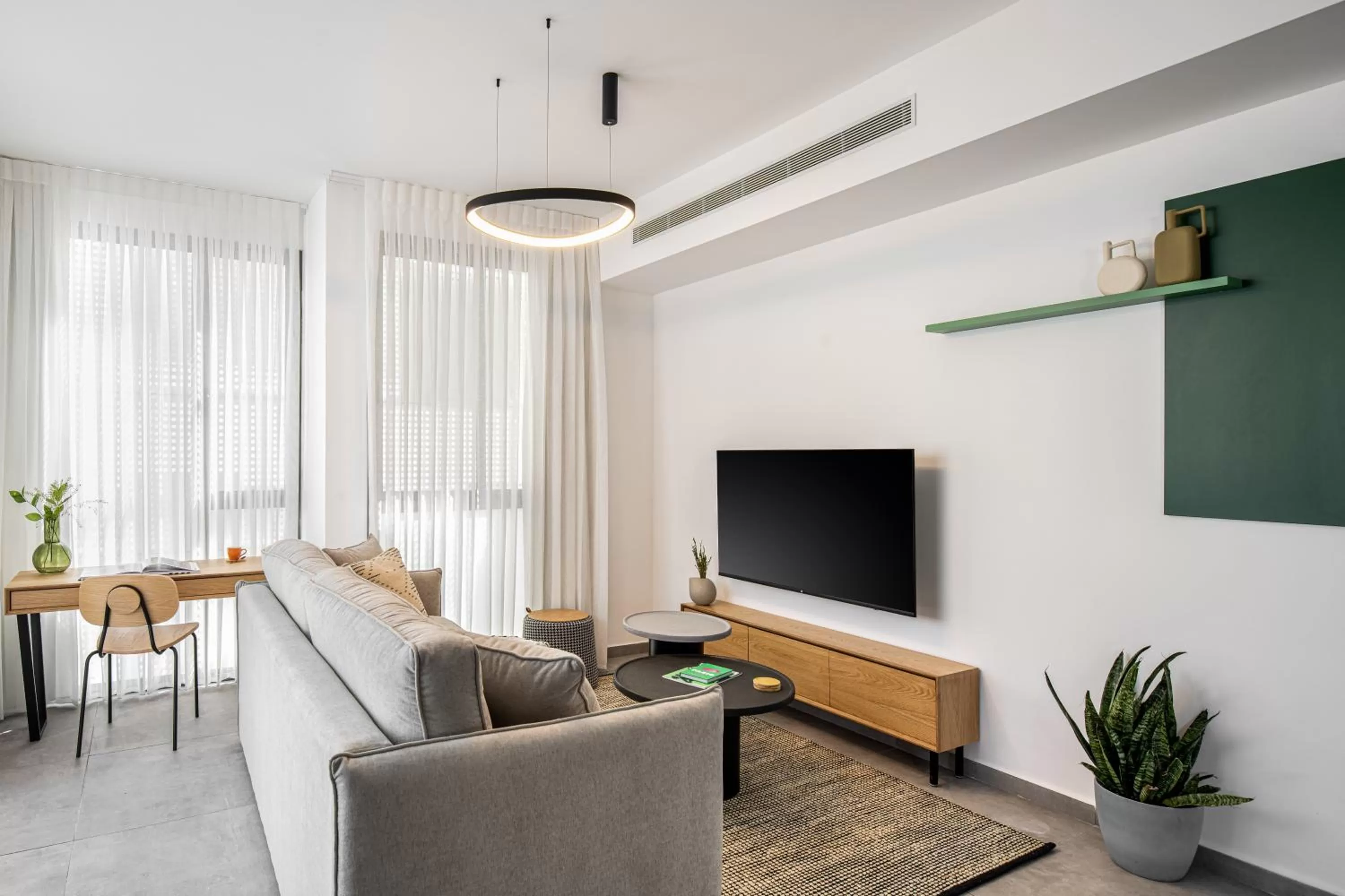 Communal lounge/ TV room in Mate GEORGE - By HOMY