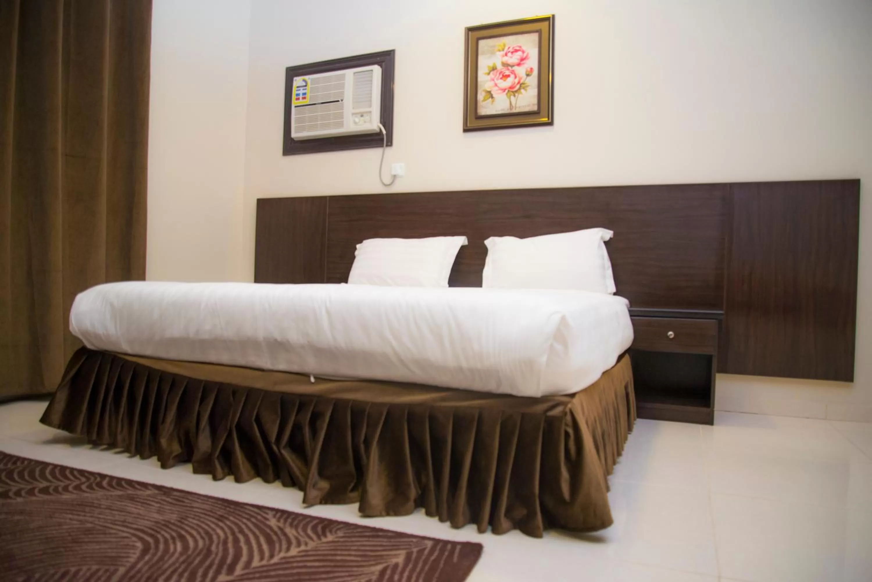 Bedroom, Bed in Shams Suites Furnished Units