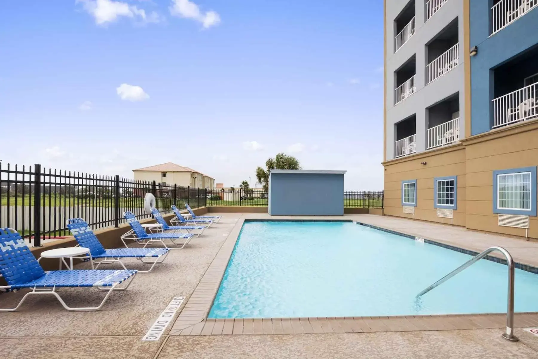 Swimming Pool in Days Inn & Suites by Wyndham Galveston West/Seawall