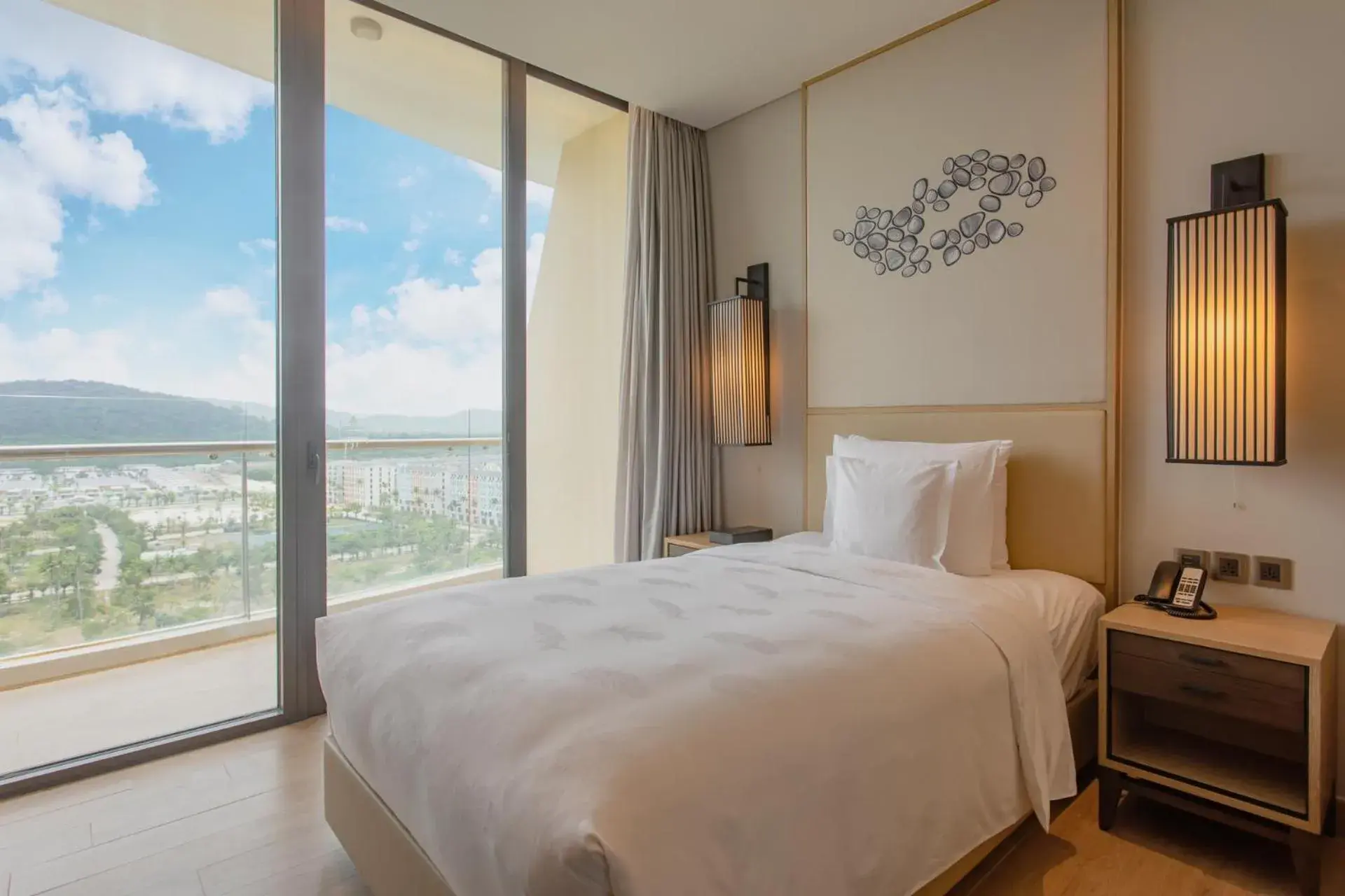 Bedroom in InterContinental Phu Quoc Long Beach Resort, an IHG Hotel