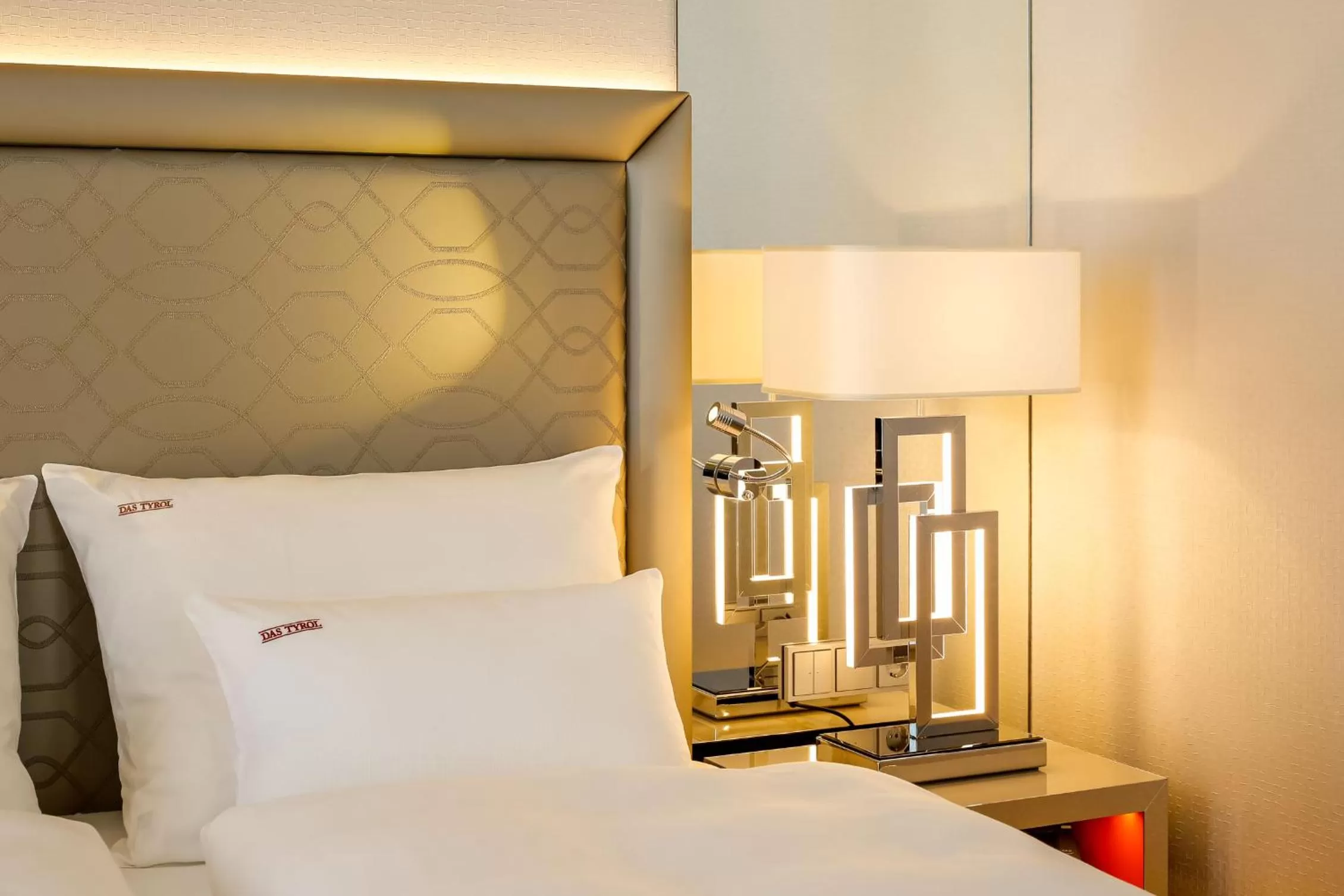 Bed in Boutiquehotel Das Tyrol