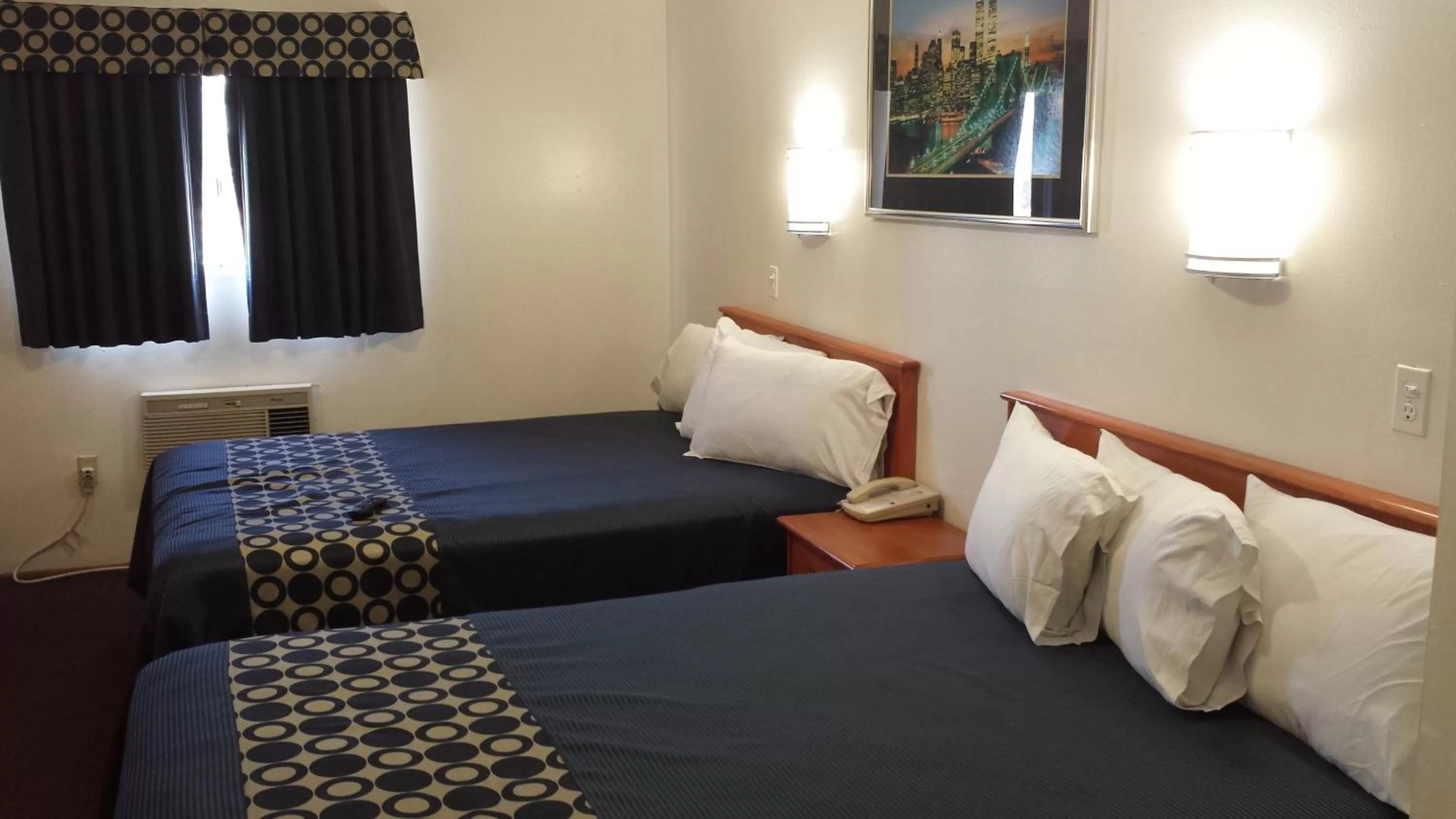 Bed in Americas Best Value Inn Beaumont California