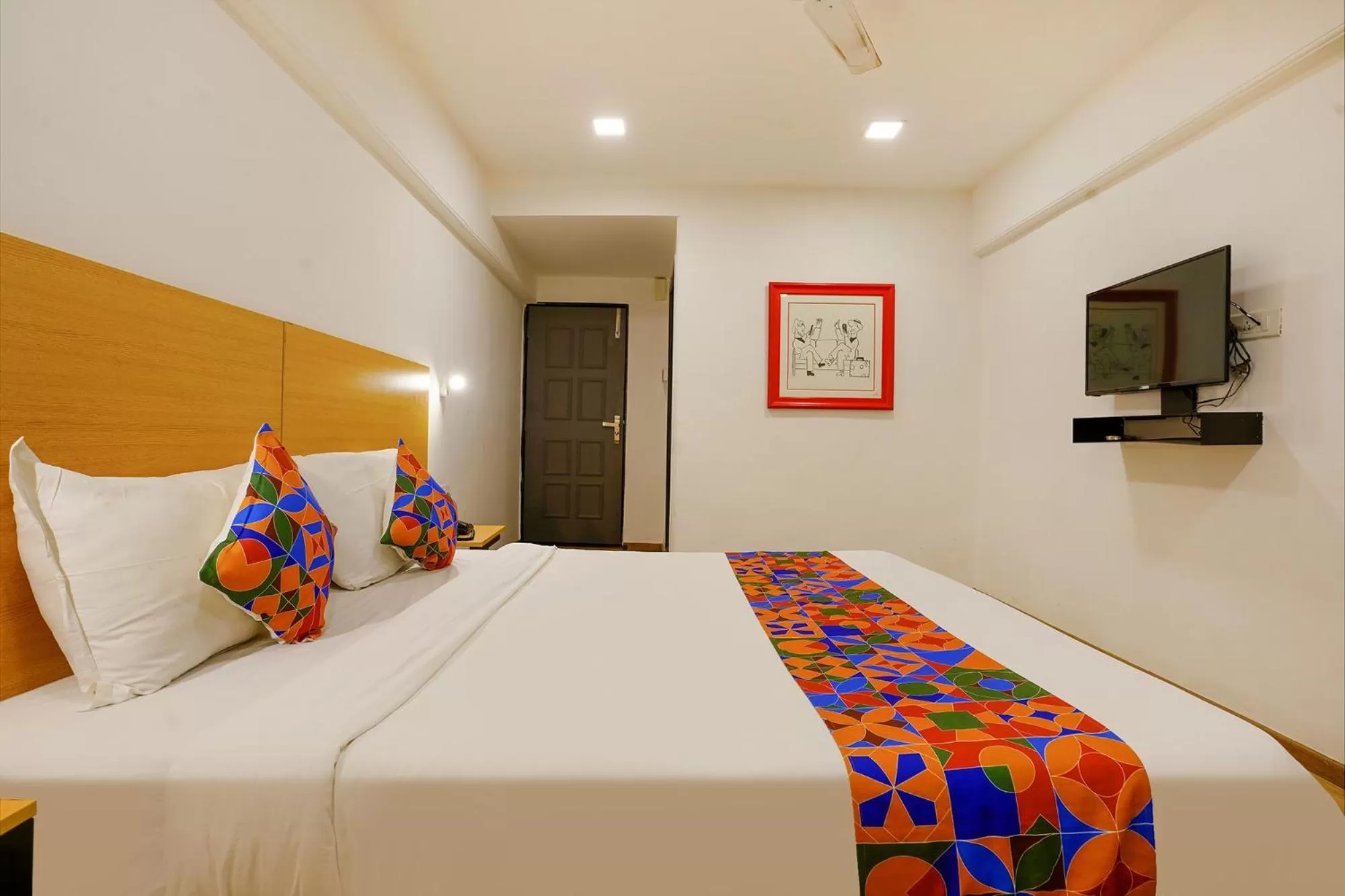 Communal lounge/ TV room, Bed in FabExpress Highway Residency