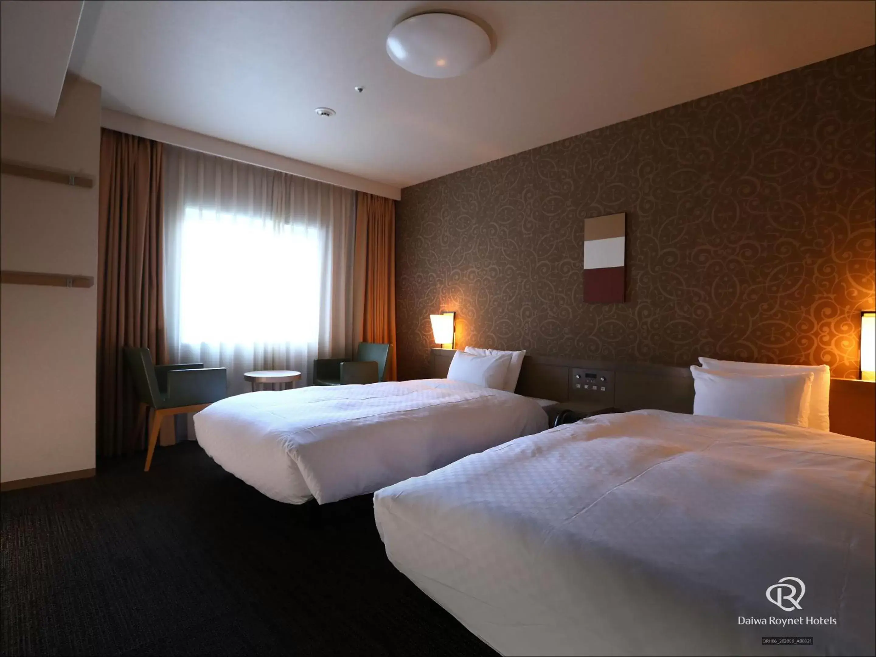 Bed in Daiwa Roynet Hotel Takamatsu
