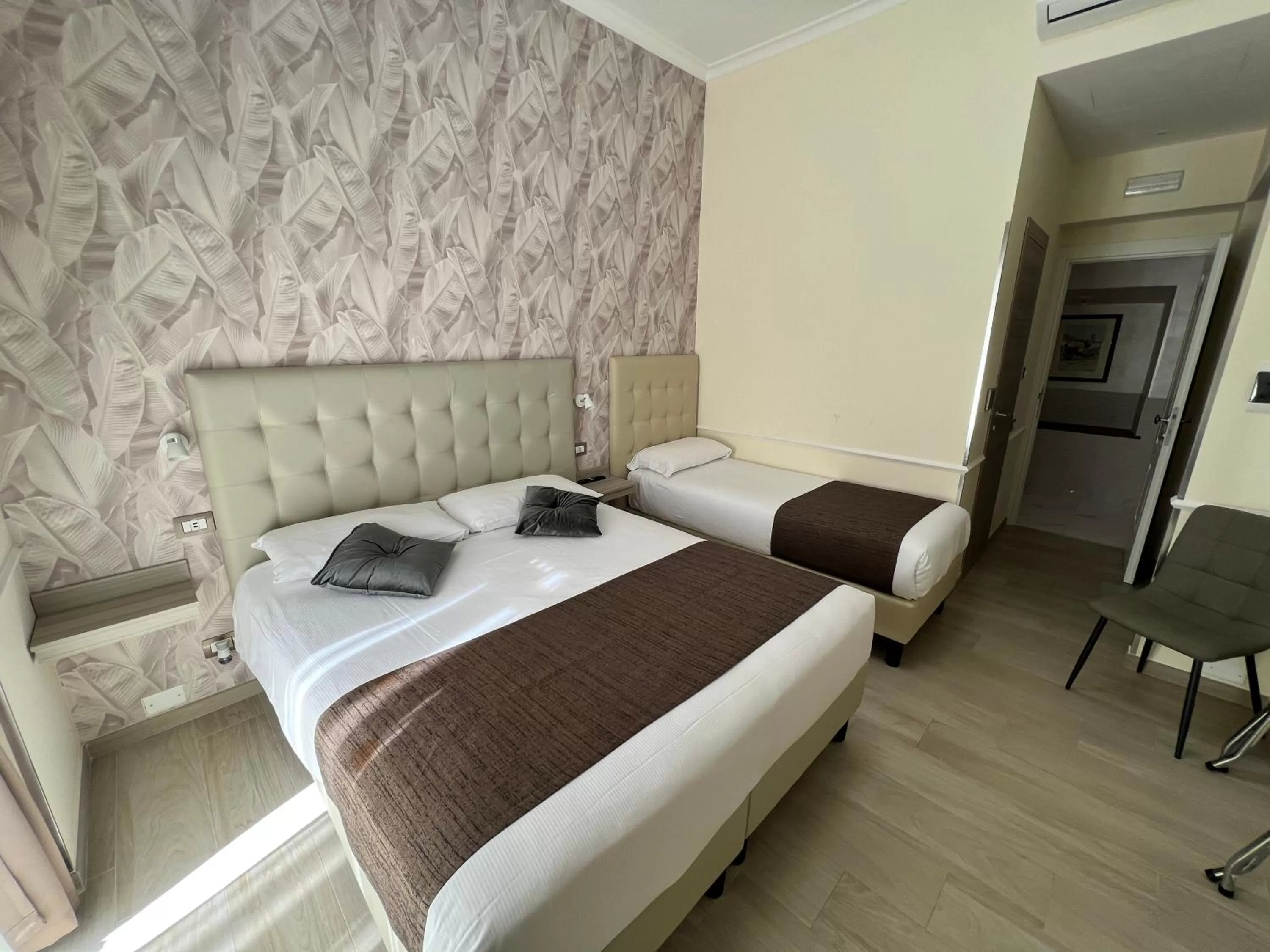 Bed in Hotel Le Petit