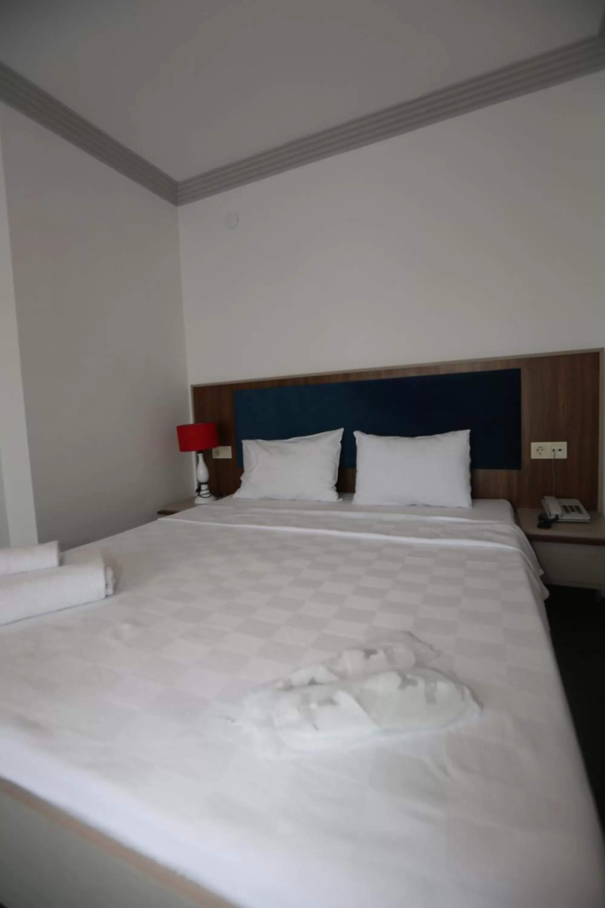 Bed in TEVETOGLU HOTEL