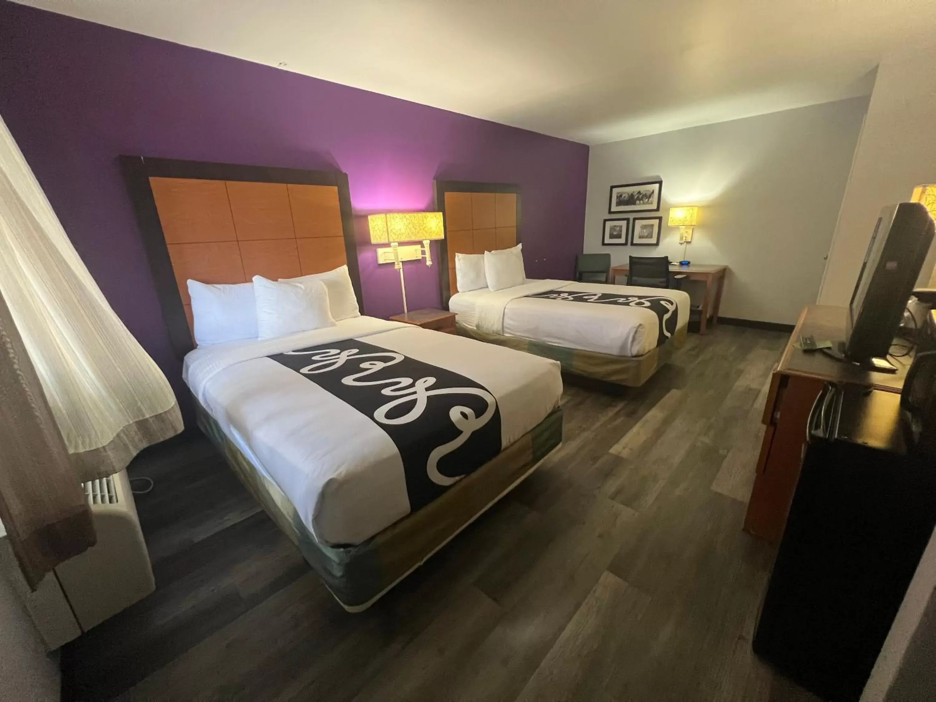 Bed in La Quinta Inn by Wyndham Amarillo Mid-City