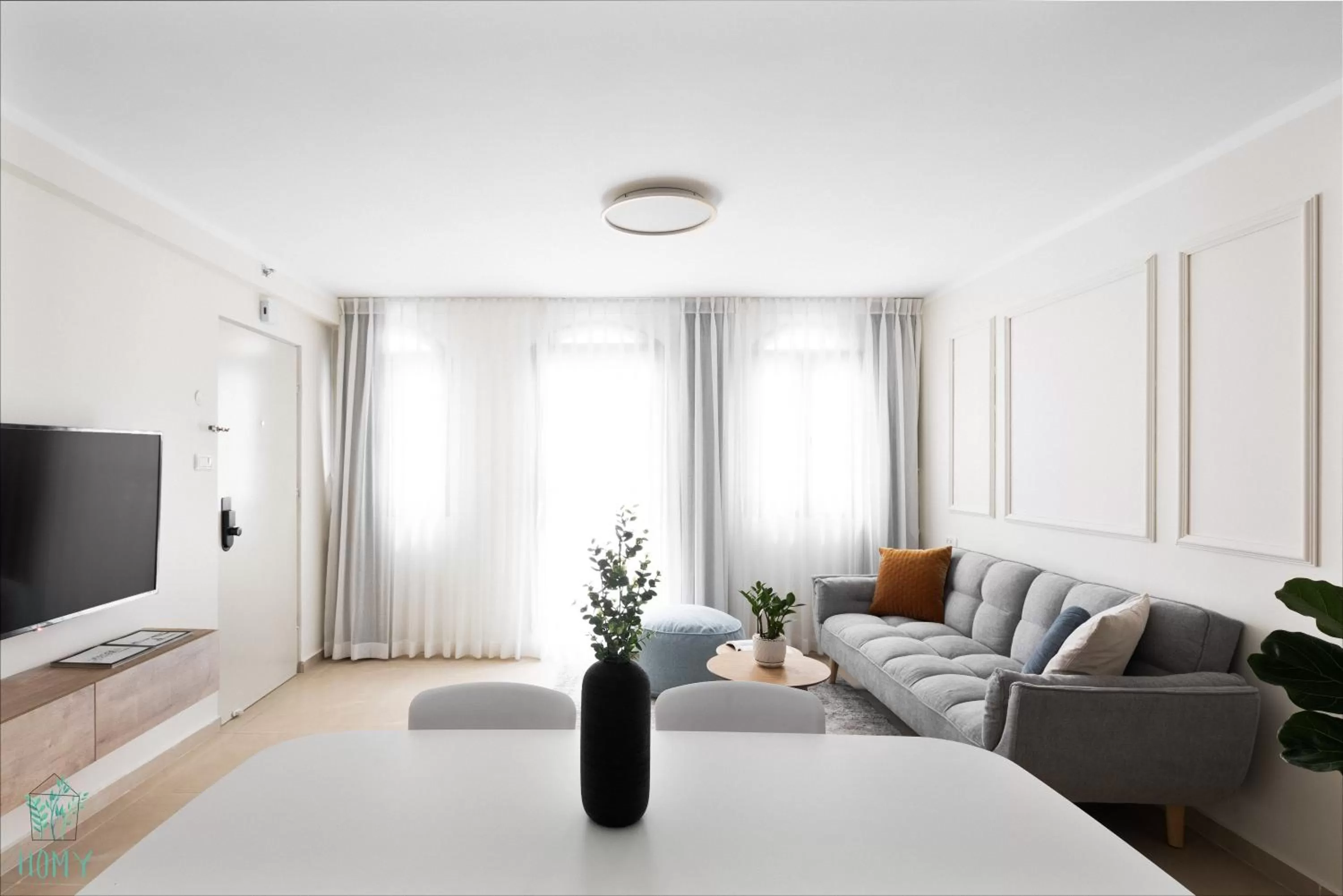 Communal lounge/ TV room, Bed in Mate ALMA - By HOMY