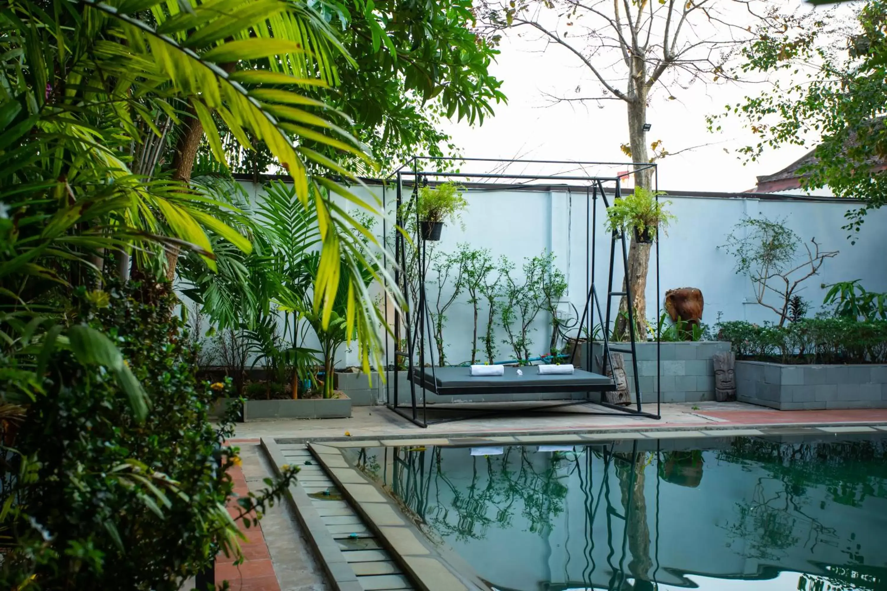 Patio, Swimming Pool in Indra Porak Residence Hotel