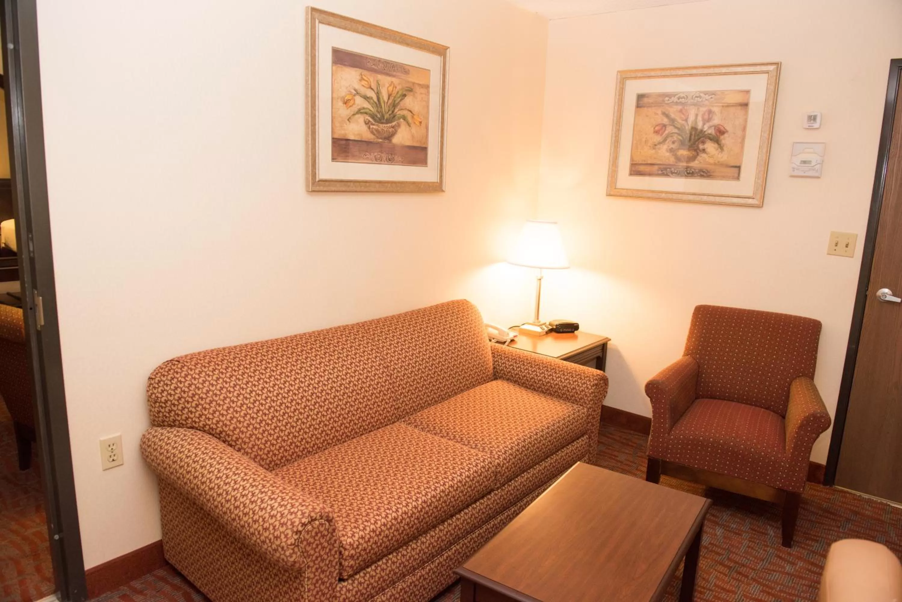 Seating area in MHO INN and SUITES
