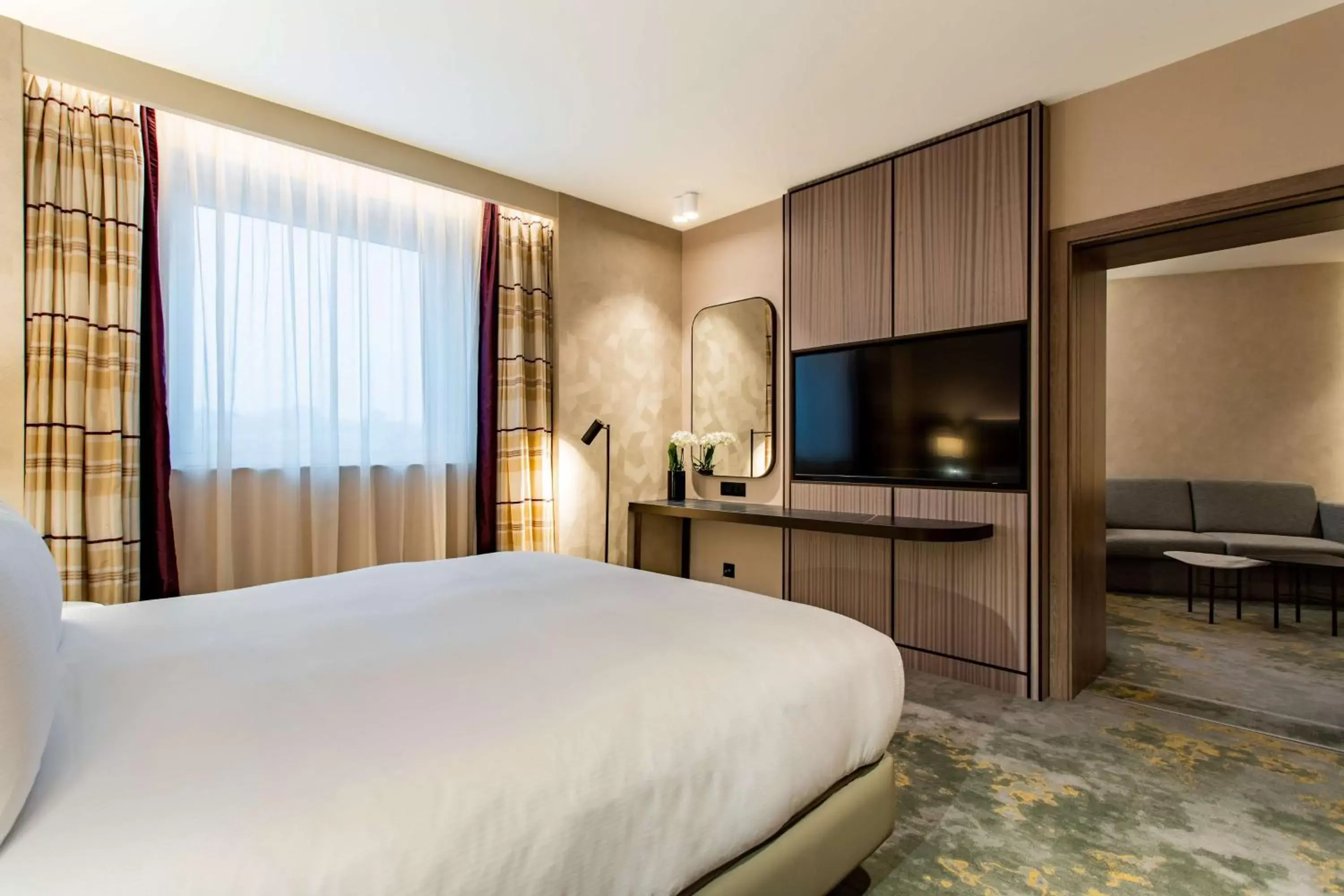 Bed, TV/Entertainment Center in Hilton Sofia