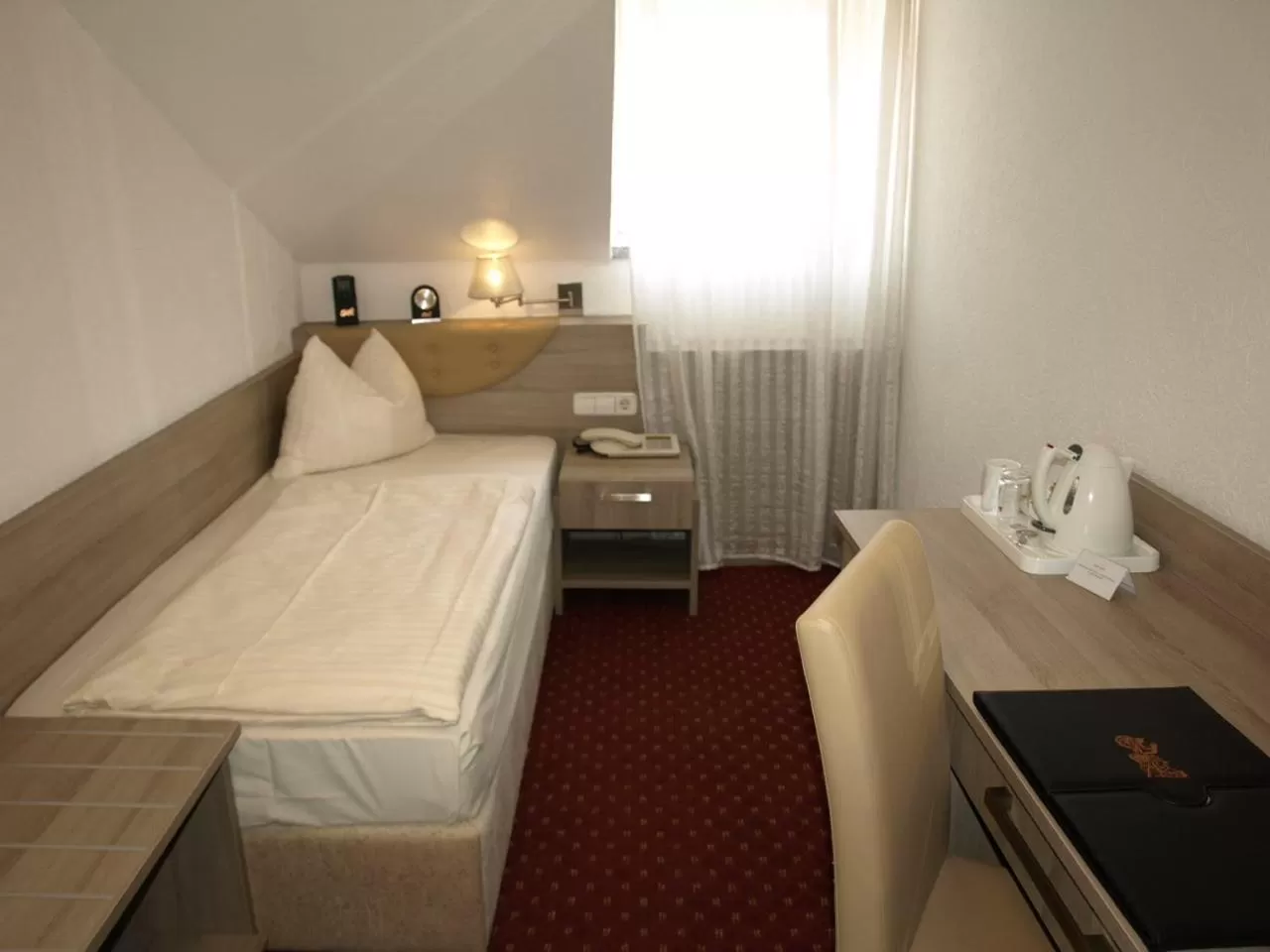 Photo of the whole room, Bed in Airport Hotel Filder Post