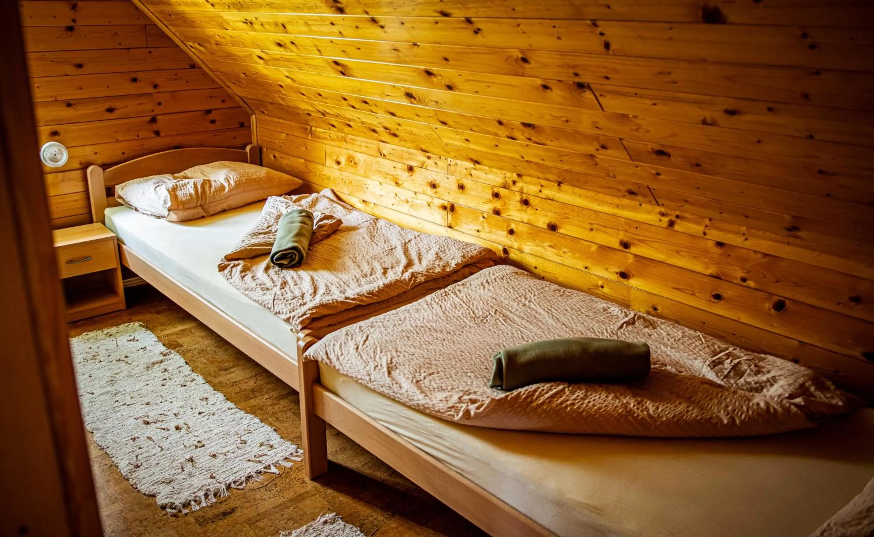 Bed in Korošec Apartments and Wellness Centre