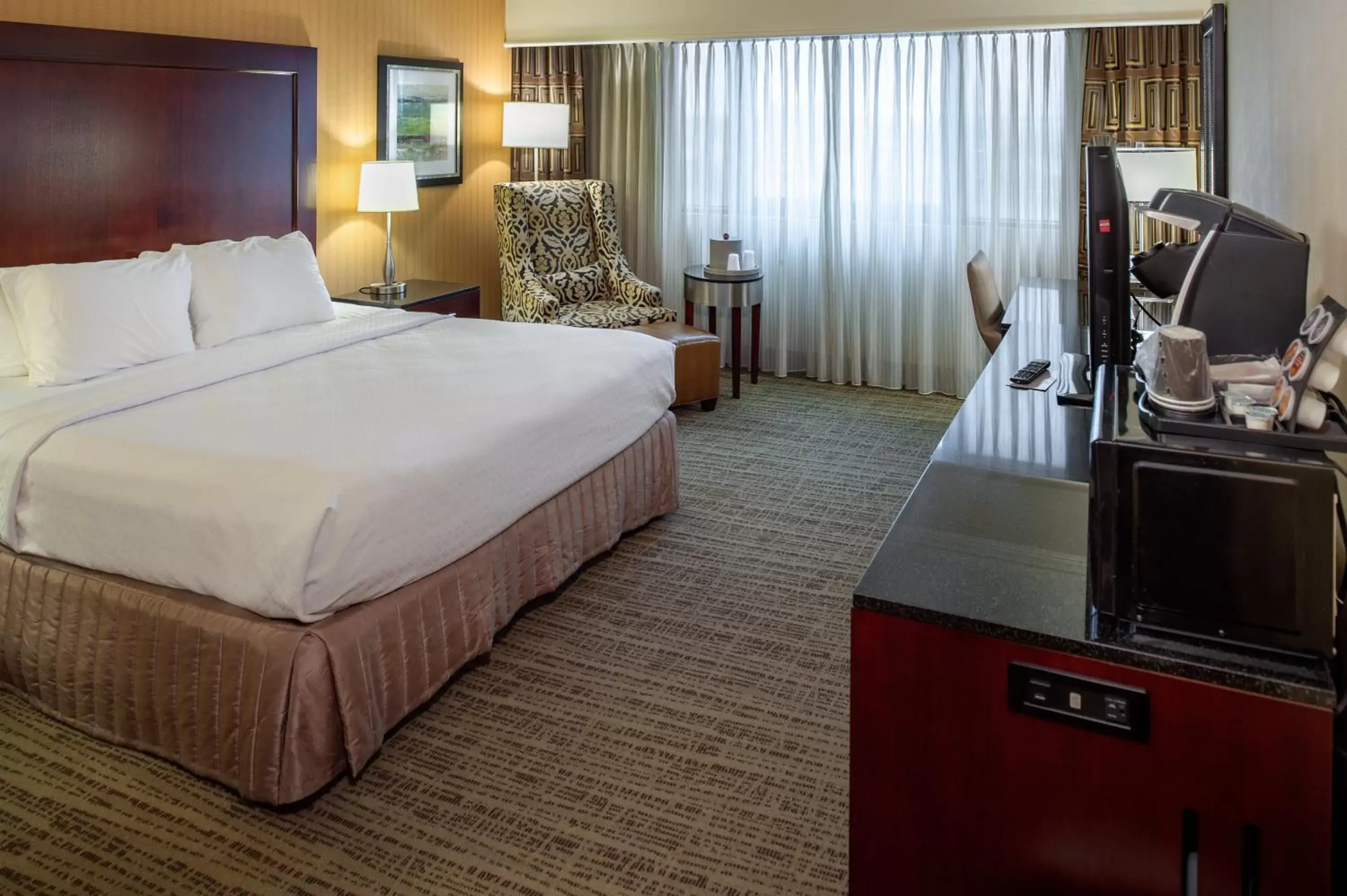 Photo of the whole room, Bed in Crowne Plaza Hotel St. Louis Airport, an IHG Hotel