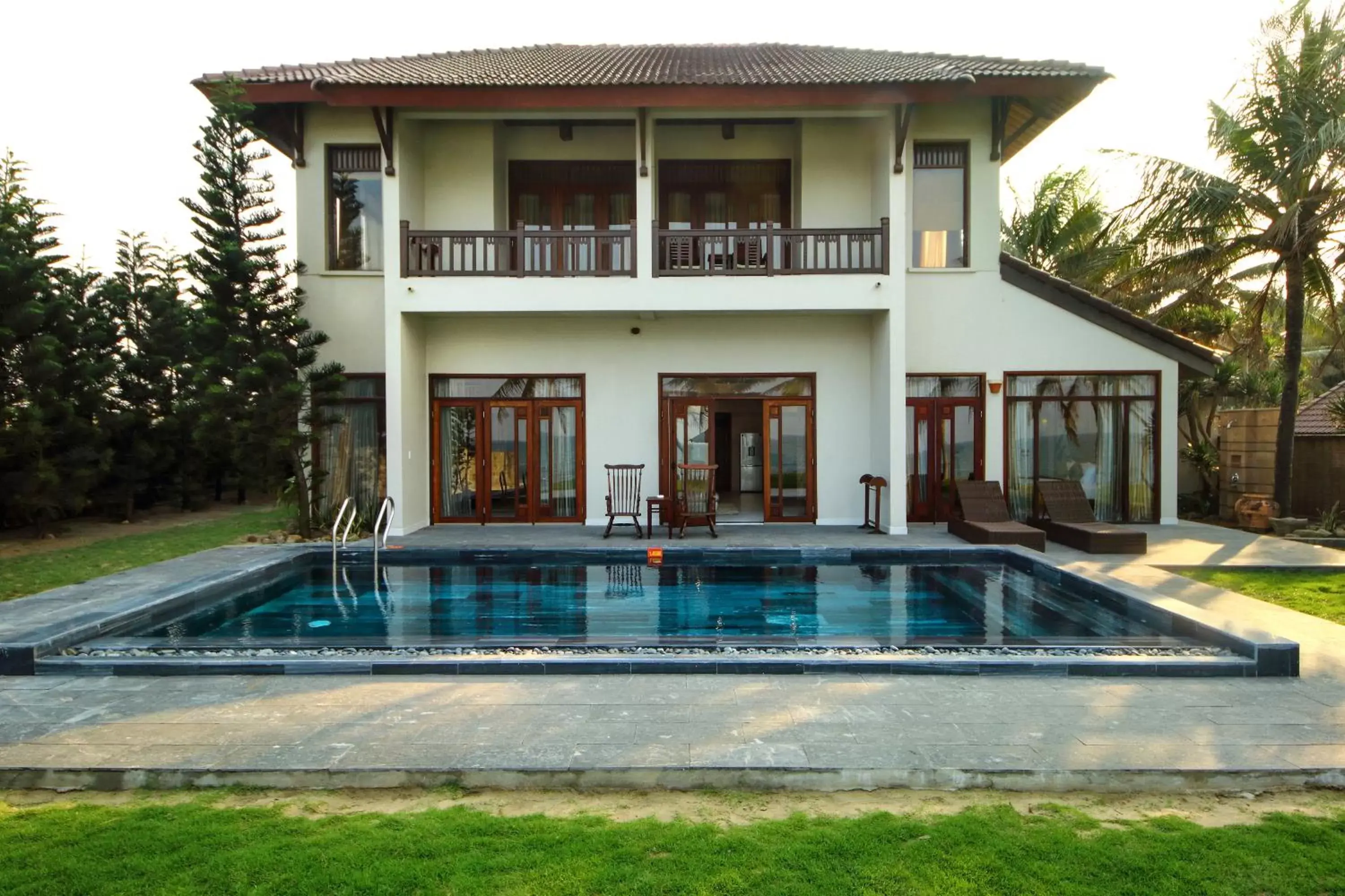 Swimming pool, Property Building in Palm Garden Beach Resort & Spa